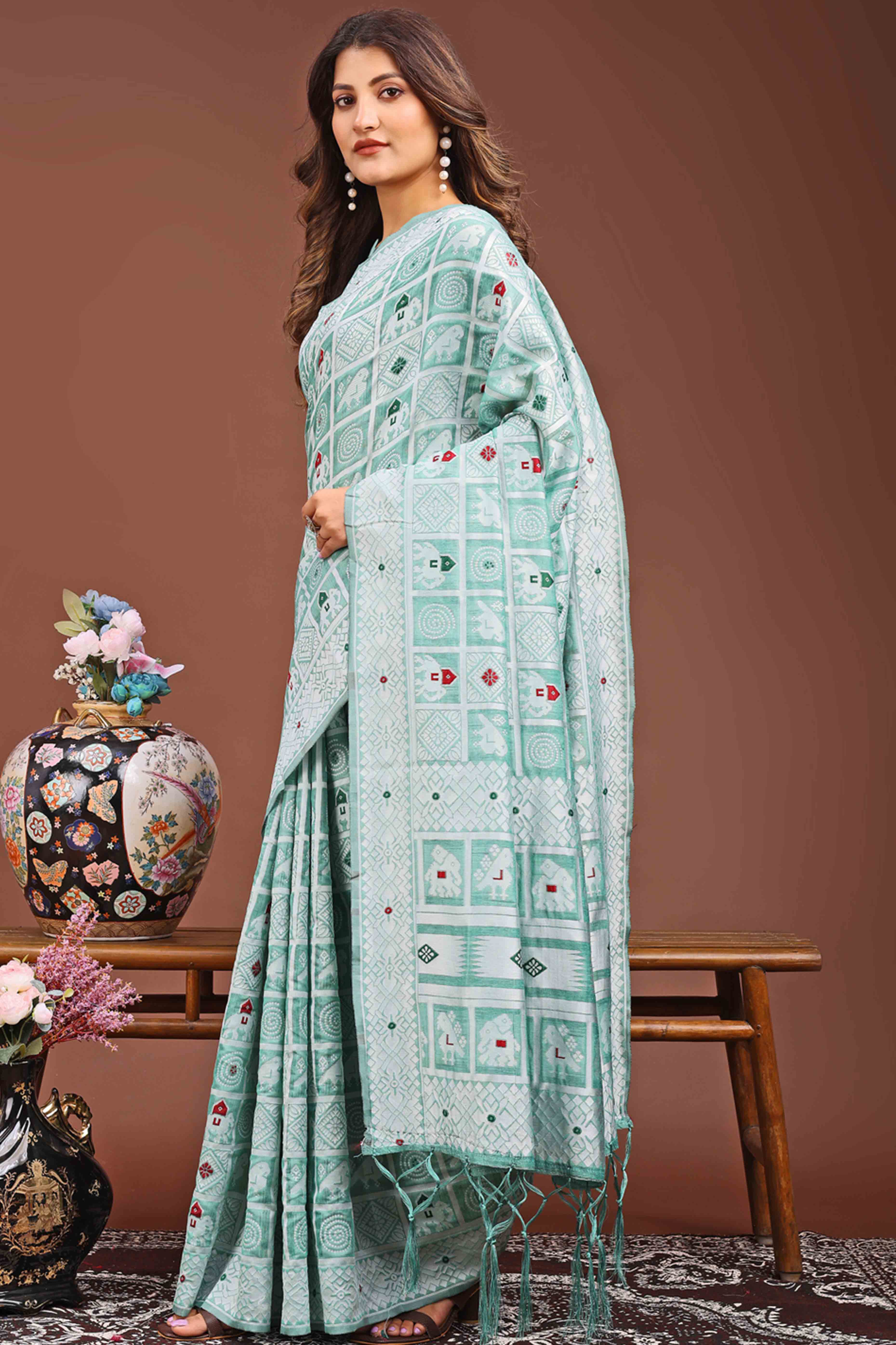 Green Linen Cotton Saree Adorned With Zari Weaving & Tassel pallu