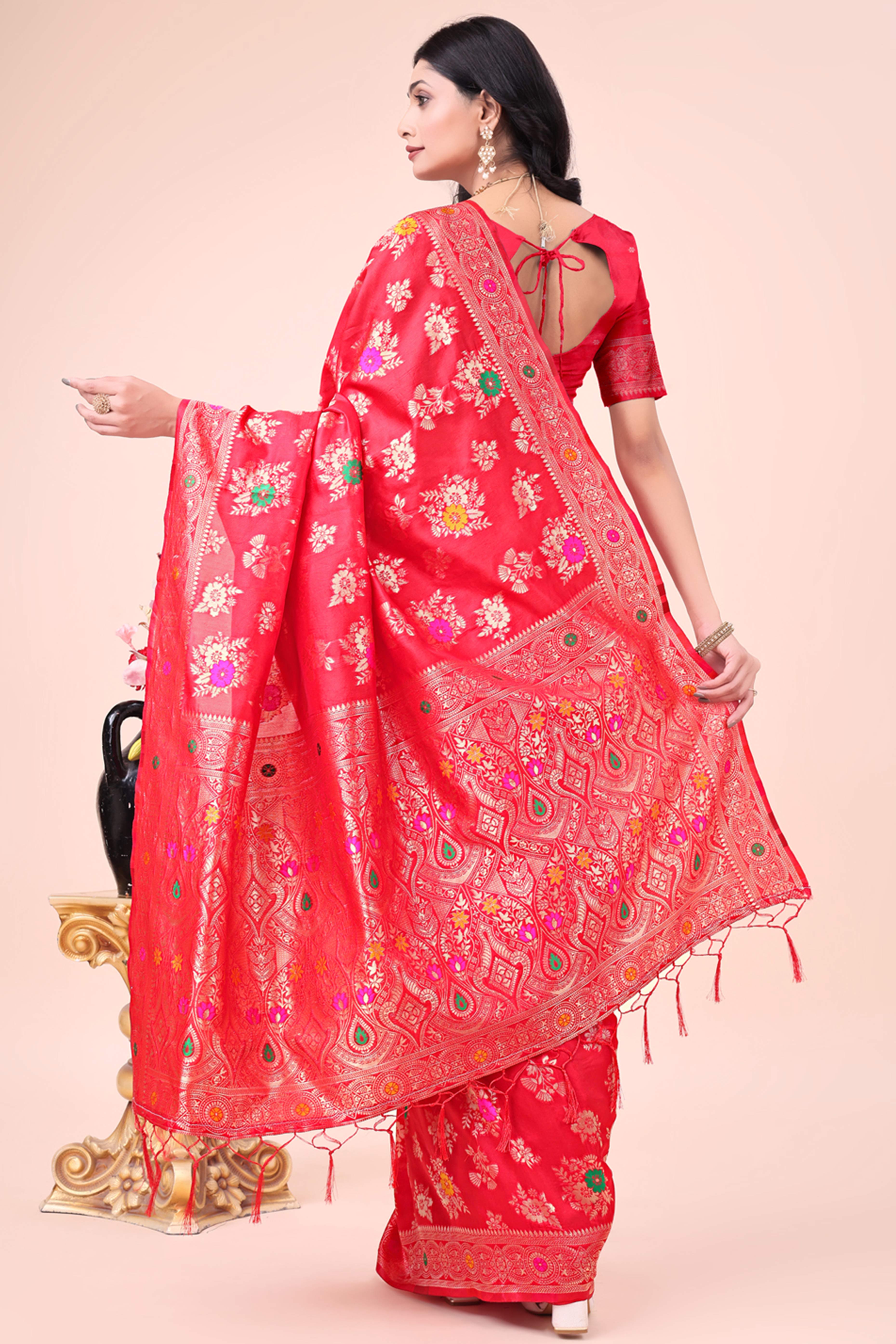Red Banarasi Silk Saree With Intricate Floral Weave & Elegant Tassel Accents