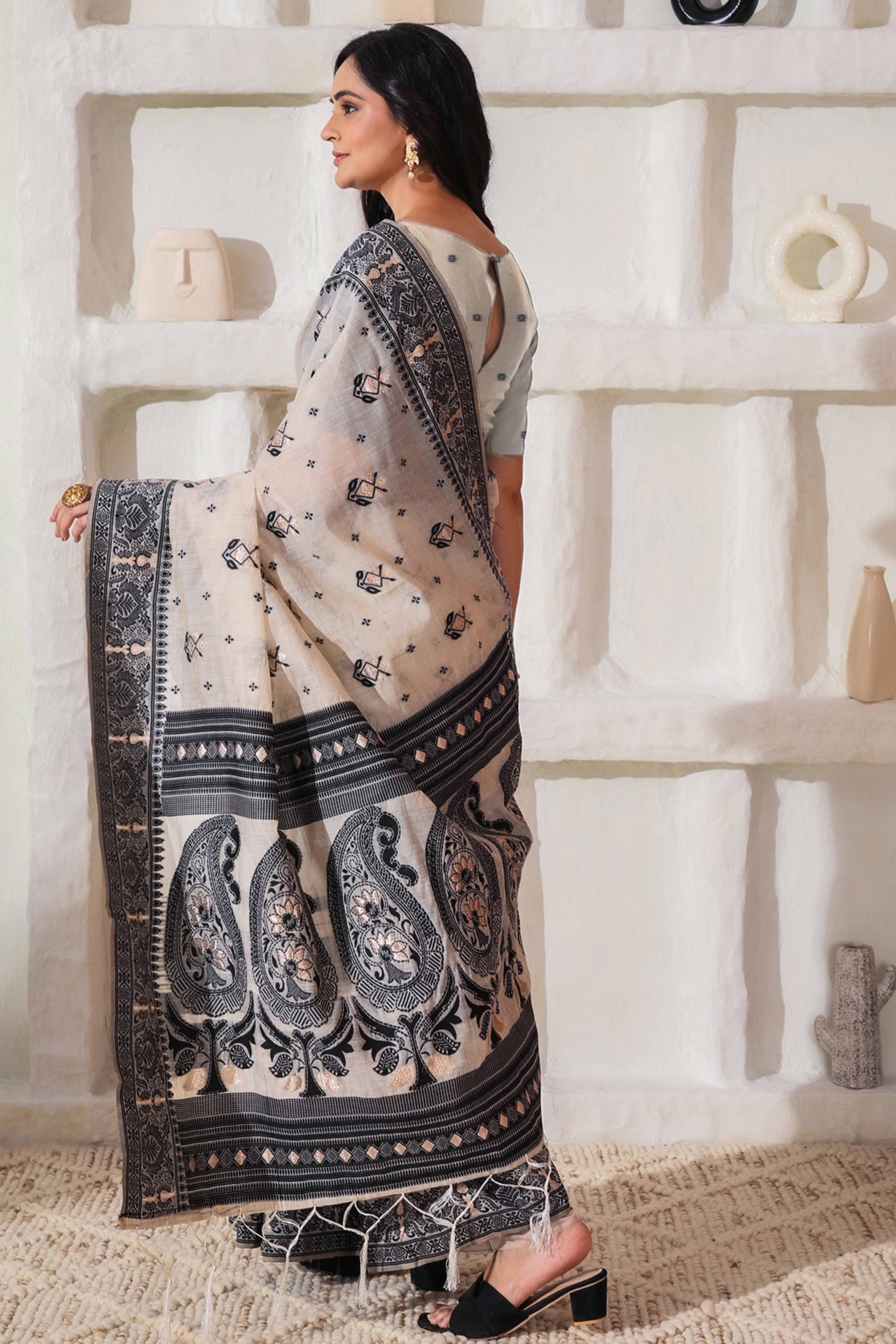 Classic Cream & Black Linen Cotton Saree Featuring Intricate Zari Weaving & Tassel Pallu