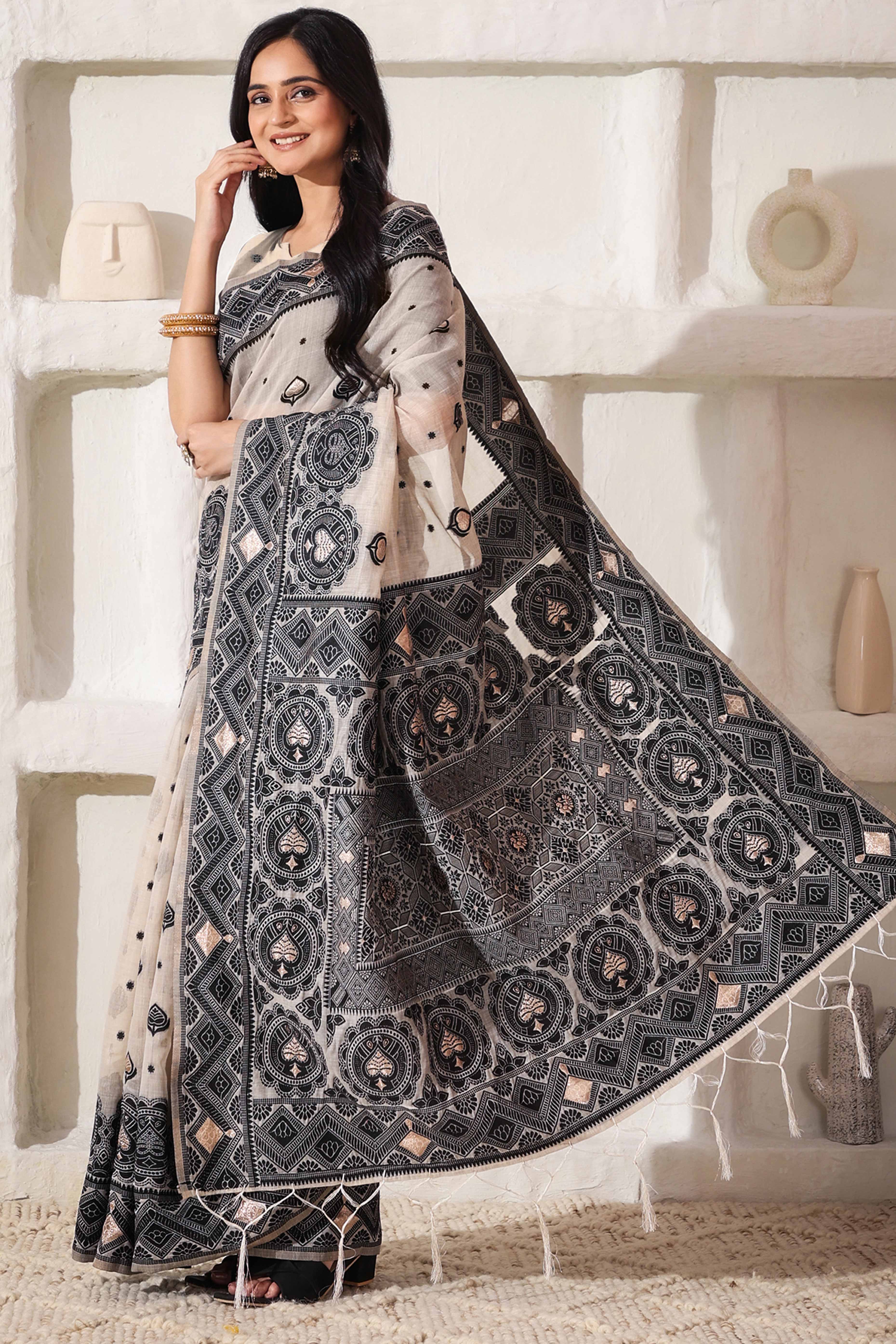 Timeless Cream & Black Saree In Linen Cotton With Rich Zari Weaving And Tassel Pallu