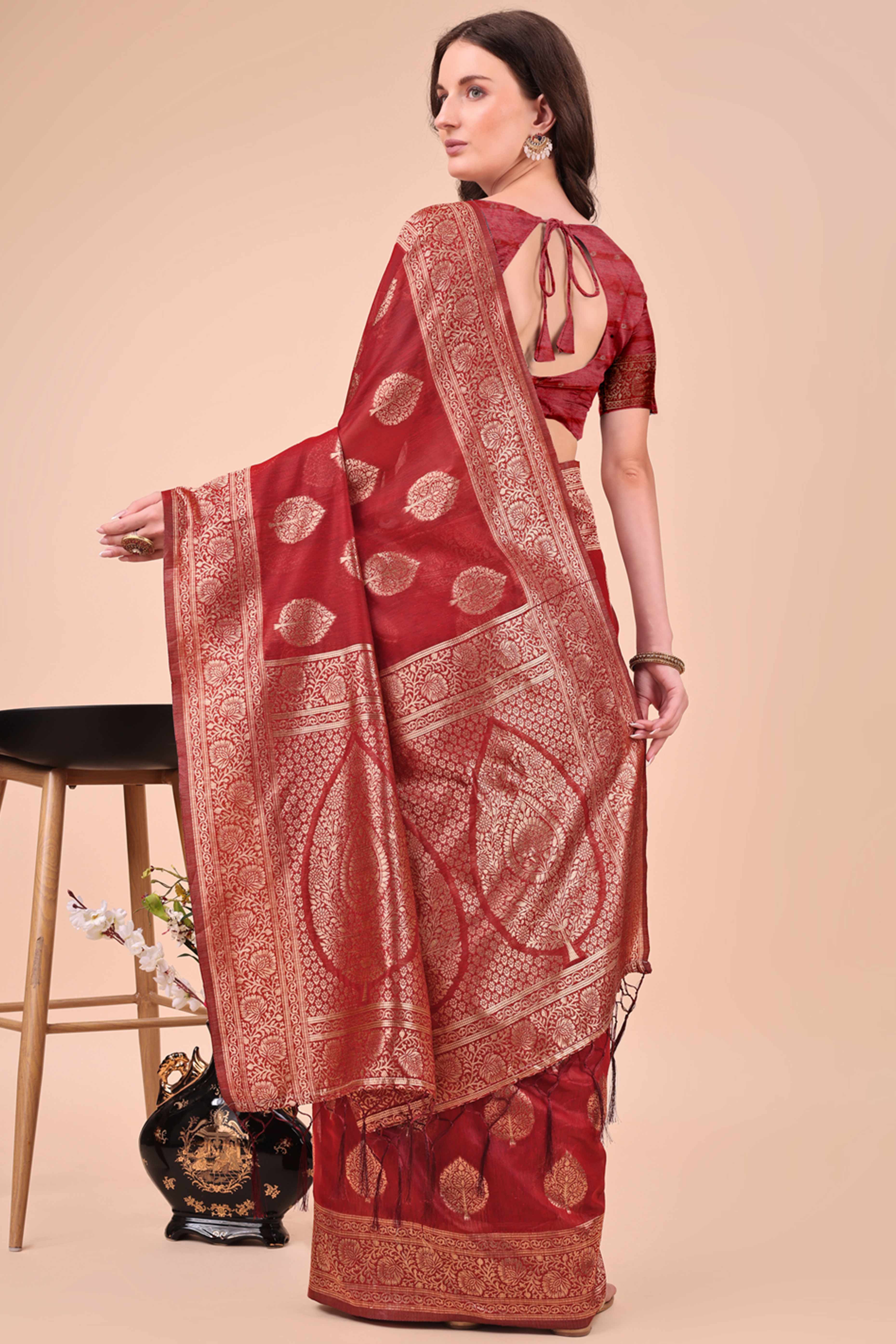 Maroon Cotton Blend Saree With Intricate Floral Zari Weaving & Elegant Tassel Accents