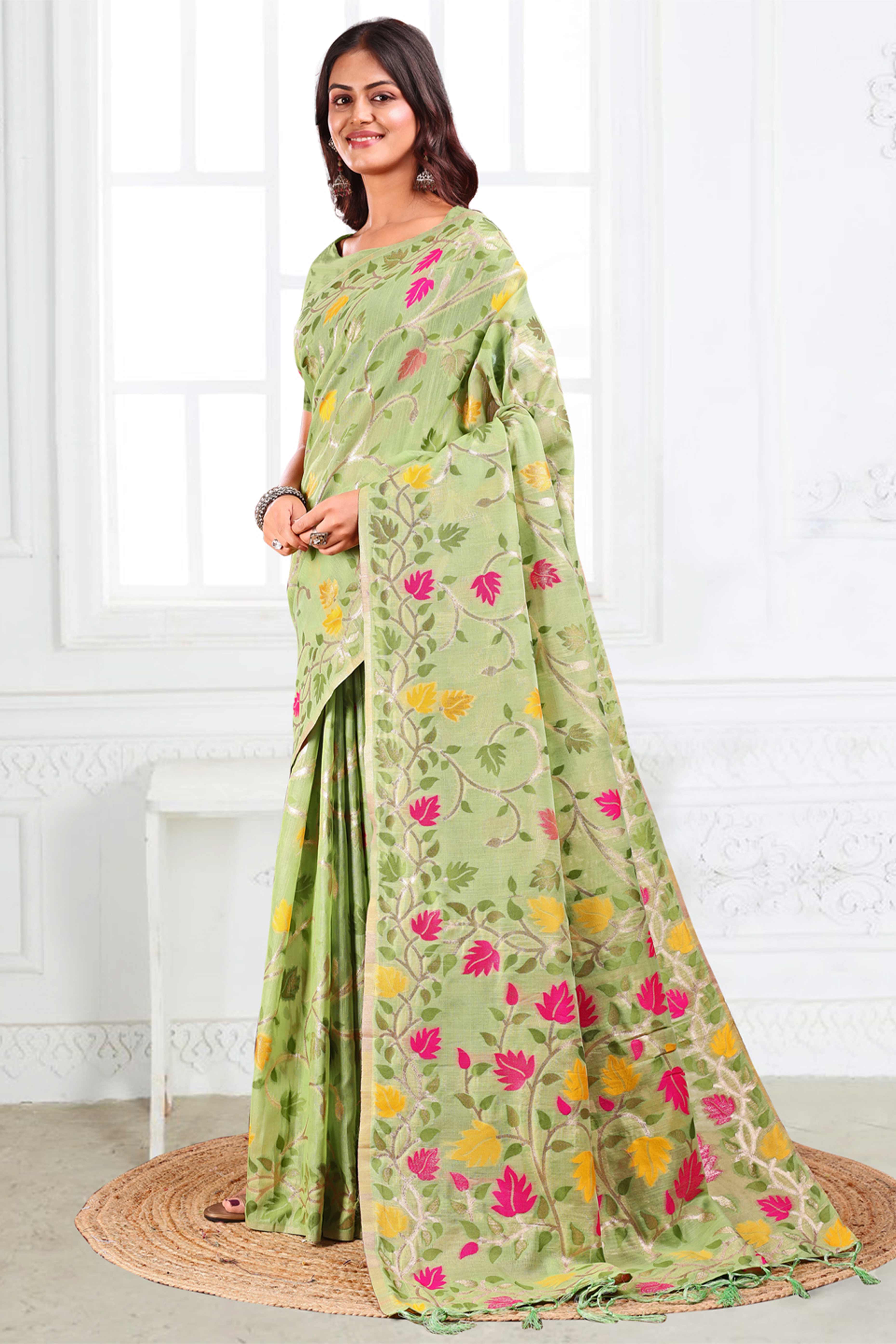 Light Green Linen Cotton Silk  Saree Enhanced With Floral Zari Weaving & Tasselled Pallu Finish