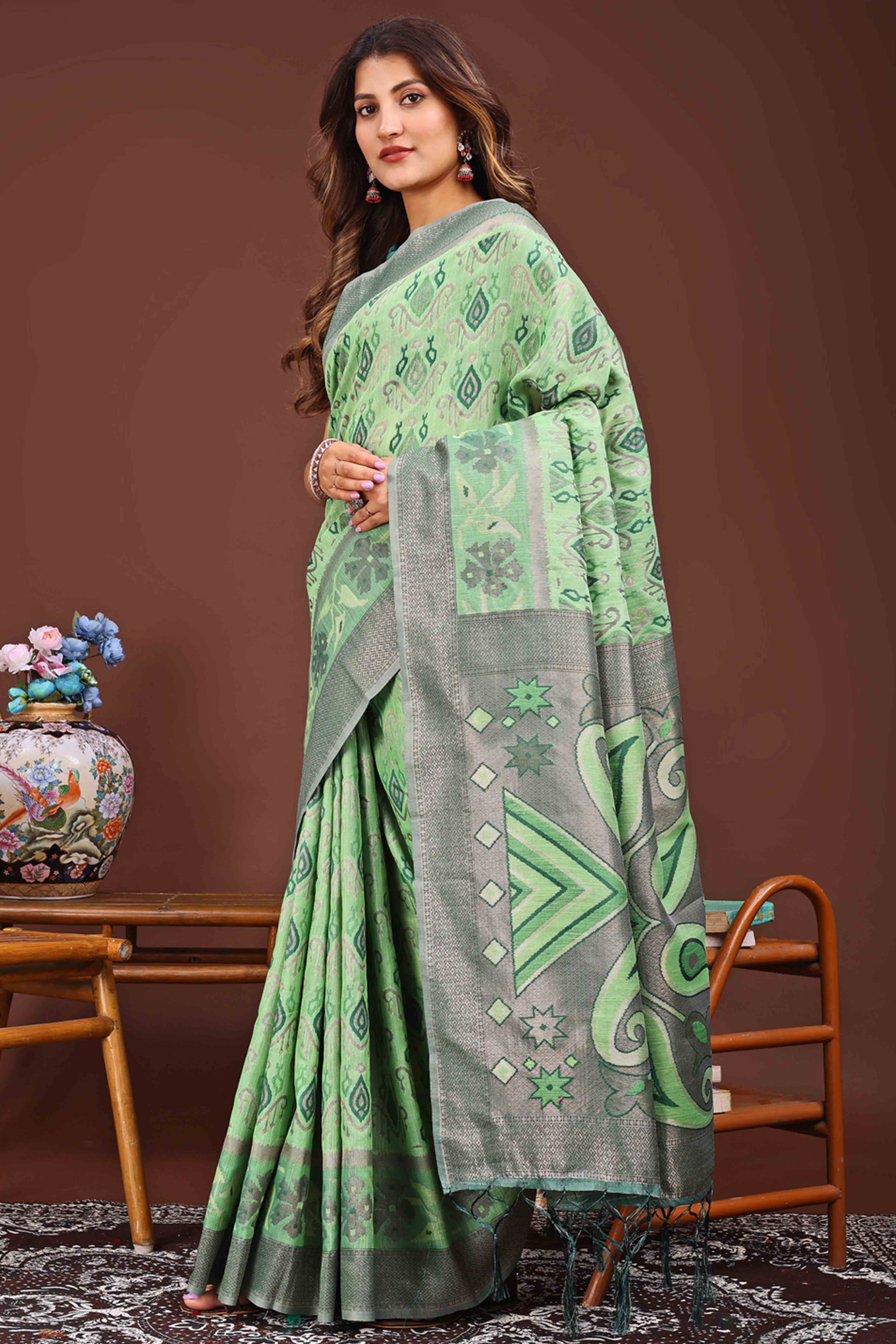 Sophisticated Zari Woven Green Linen Cotton Saree With Graceful Tassel Pallu
