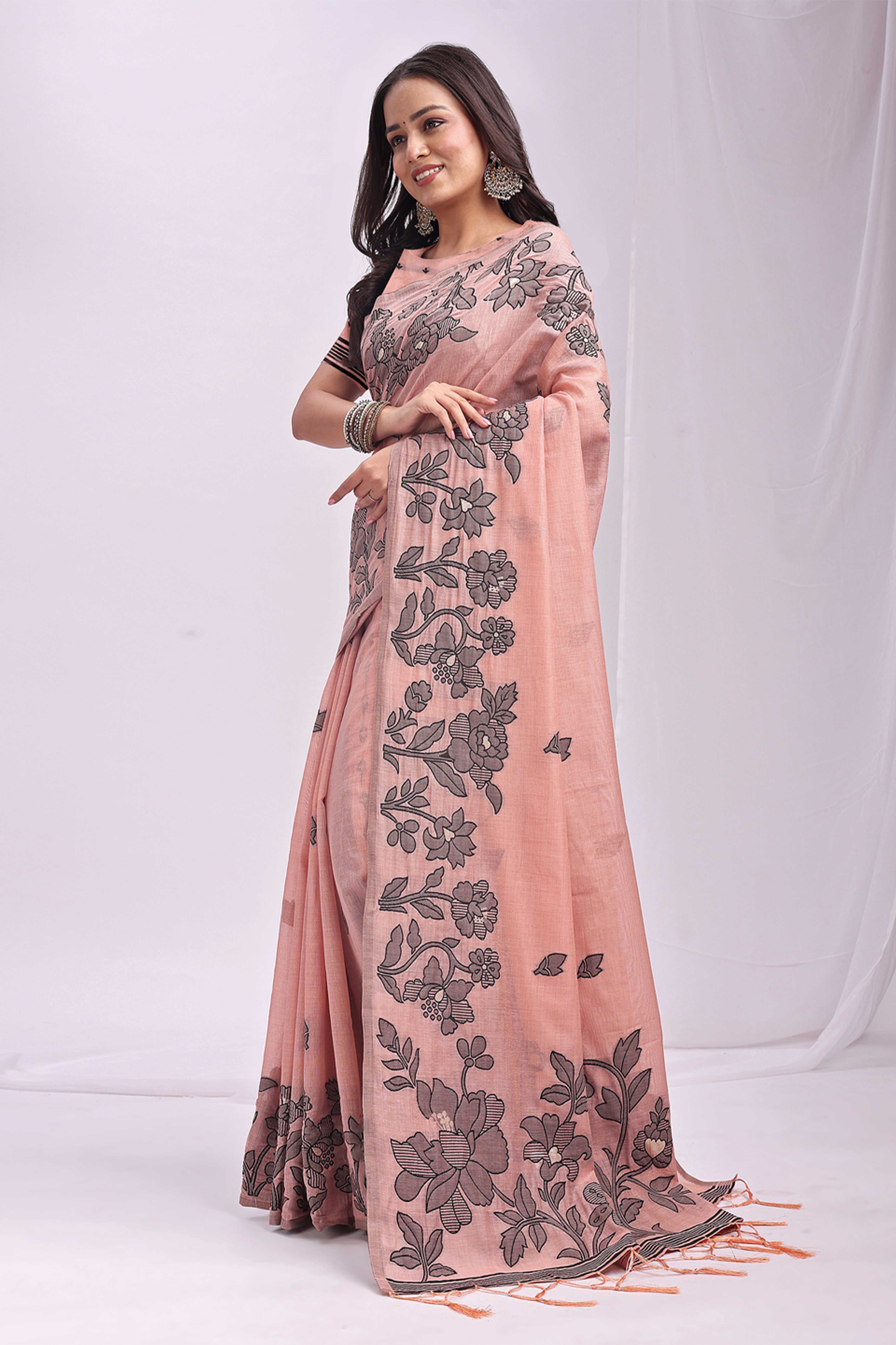 Peach Ethnic Saree in a Linen Cotton Blend Adorned with Floral Weave Designs