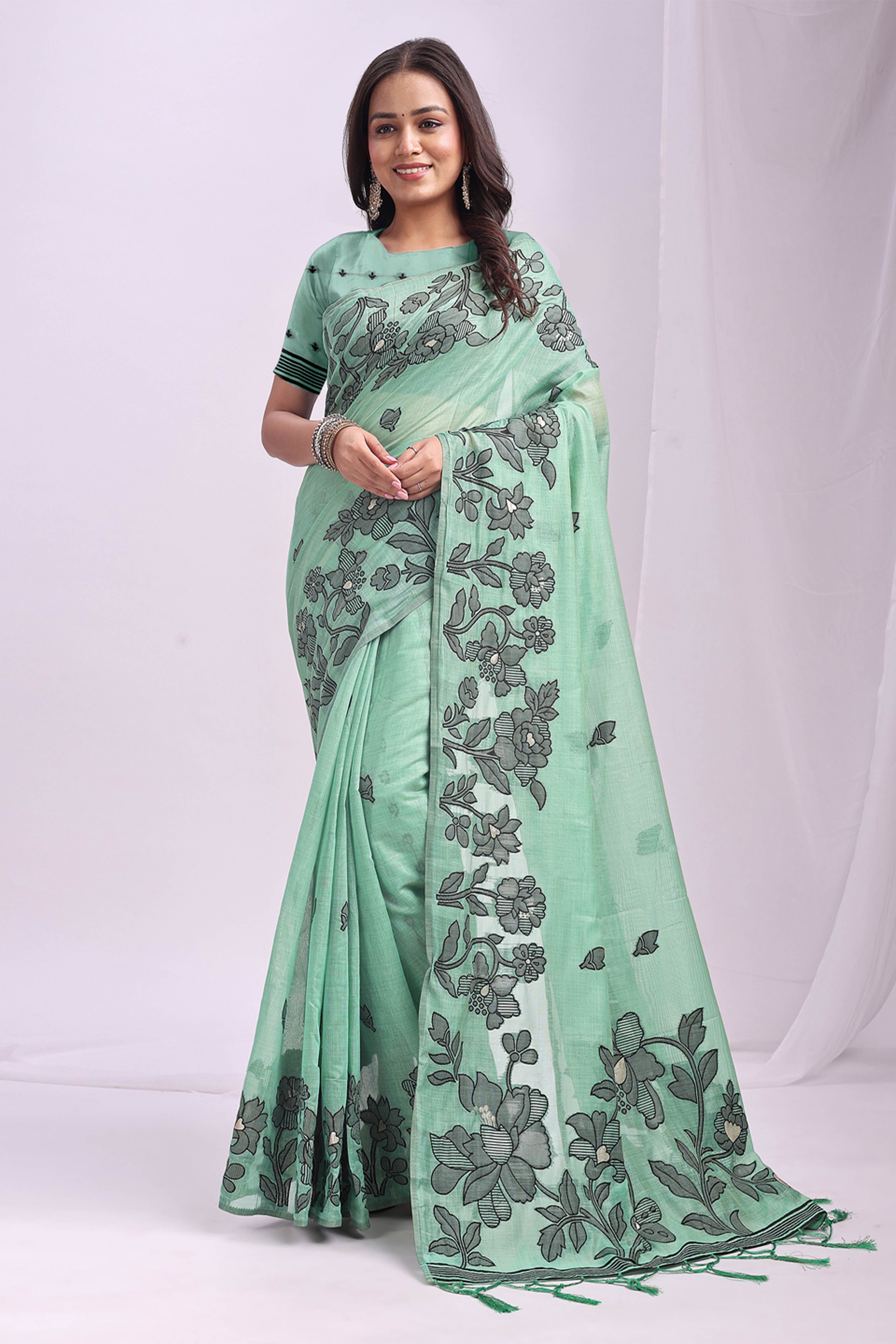 Rama Green Ethnic Saree in a Linen Cotton Blend Adorned with Floral Weave Designs