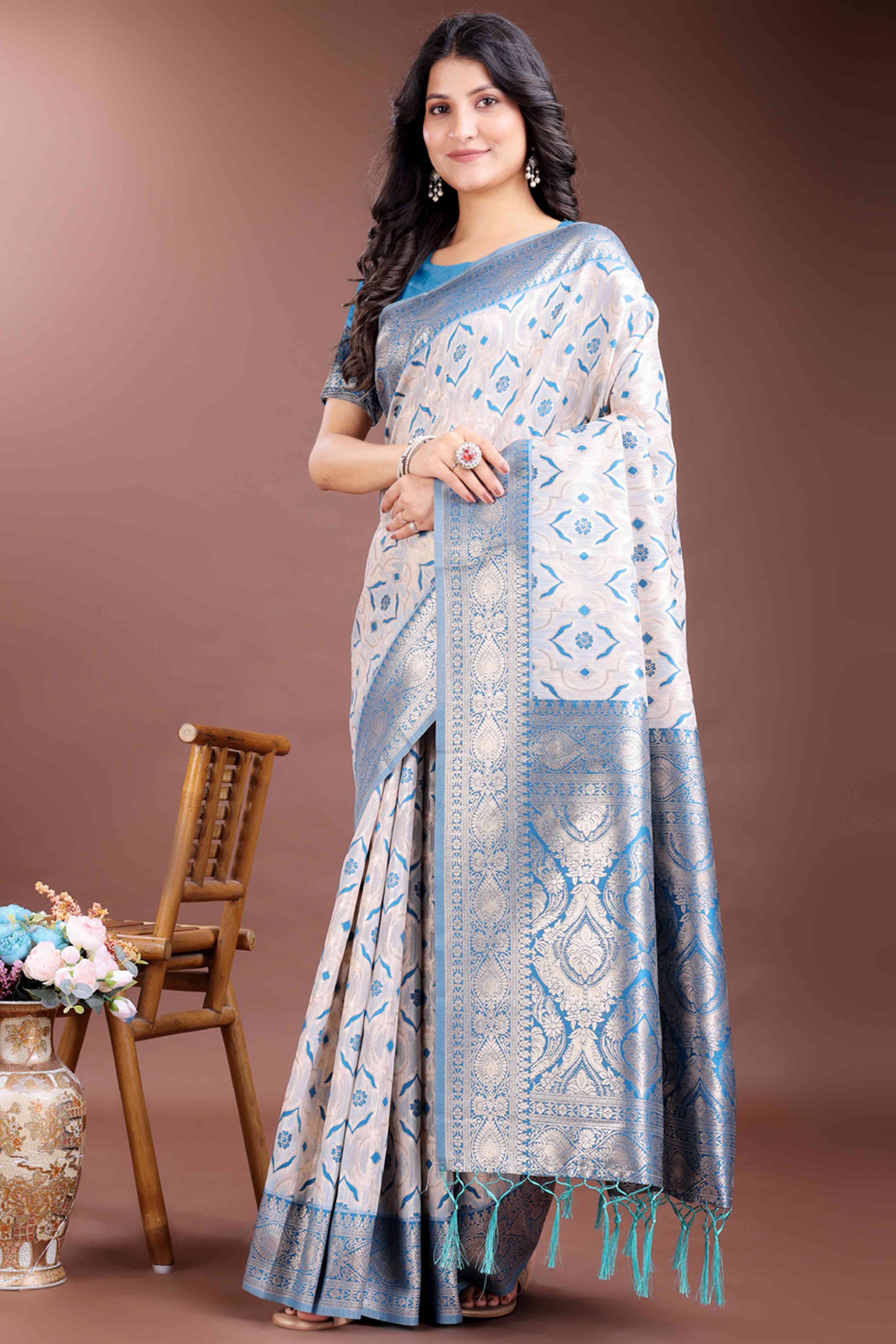 Tranquil Sky Blue Traditional Ikkat Style Zari Weaving Cotton Blend Saree with Charming Tassel Details