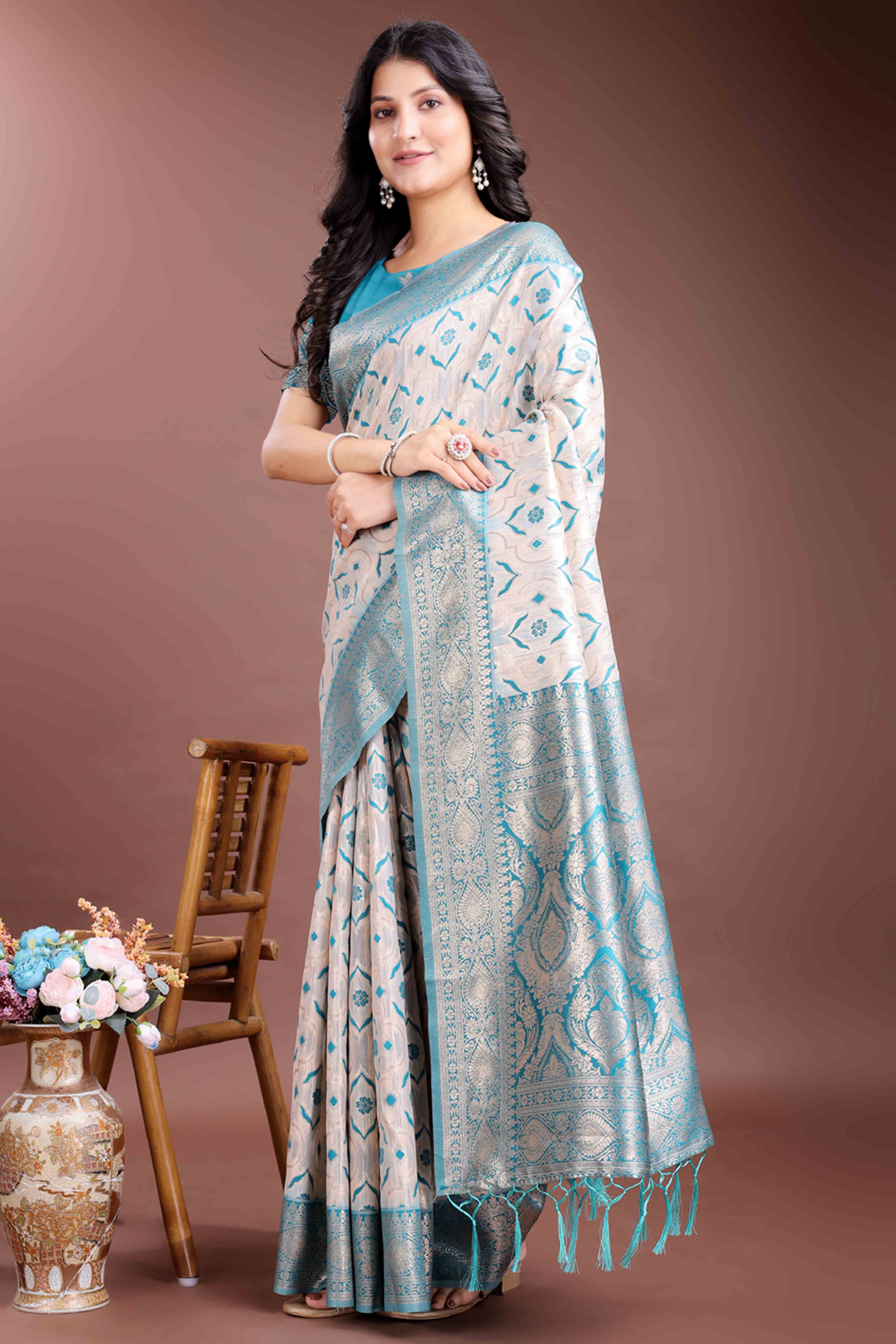 Brilliant Turquoise Traditional Ikkat Style Zari Weaving Cotton Blend Saree with Stunning Tassel Accents