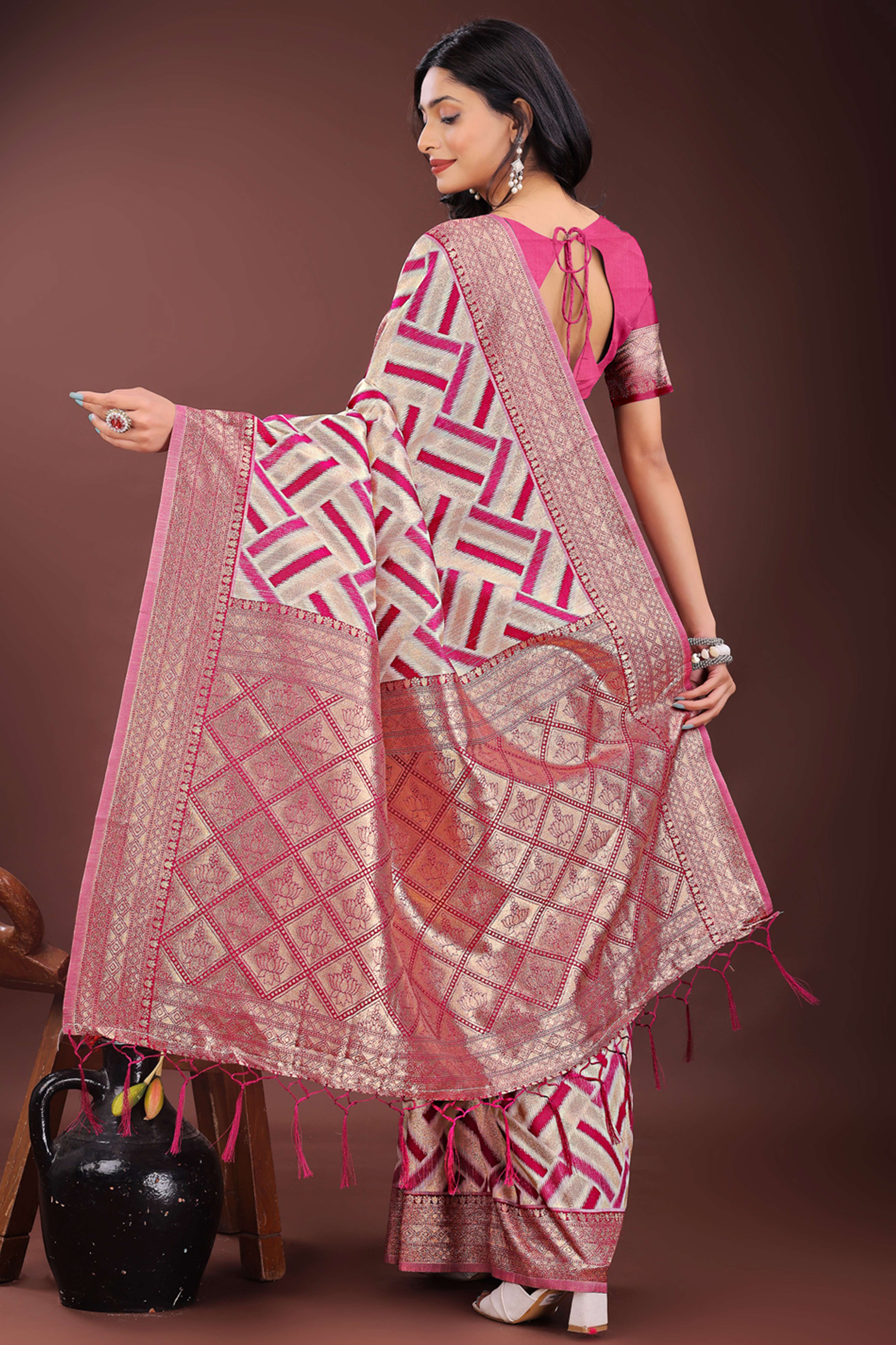 Magenta Saree with Zari Woven Geometric Motifs and Graceful Tassel Accents