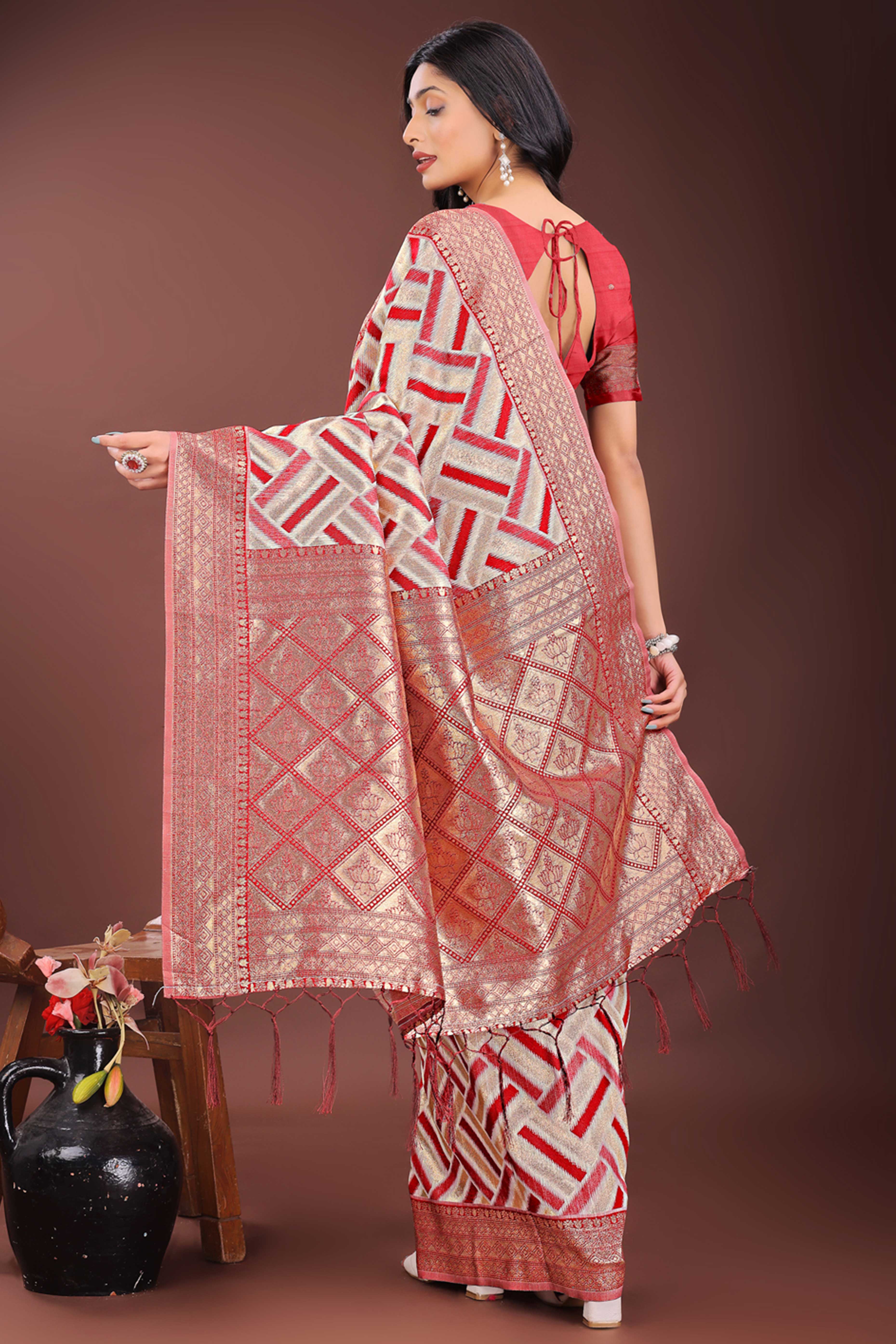 Red Saree with Zari Woven Geometric Motifs and Graceful Tassel Accents