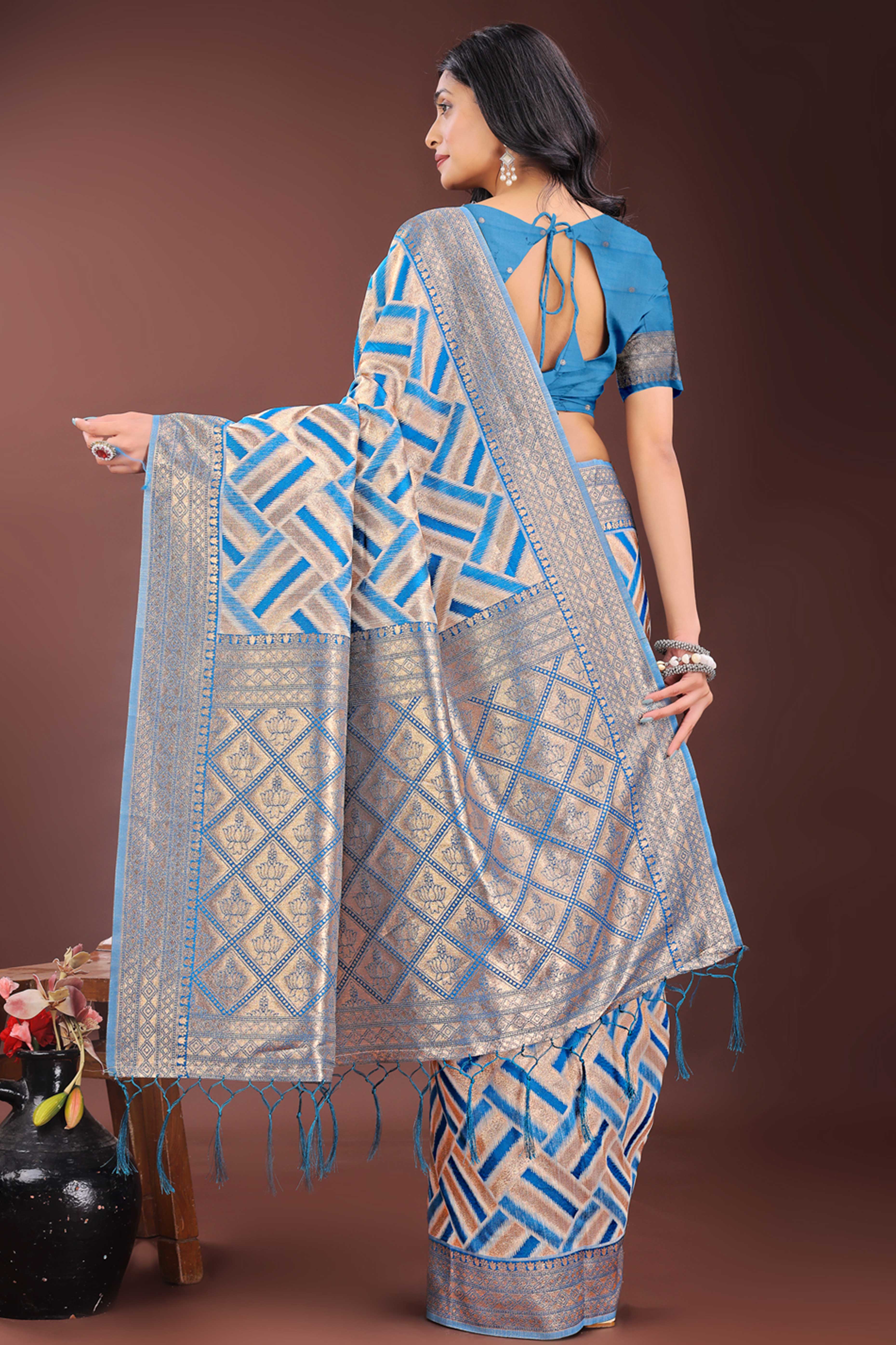 Blue Saree with Zari Woven Geometric Motifs and Graceful Tassel Accents