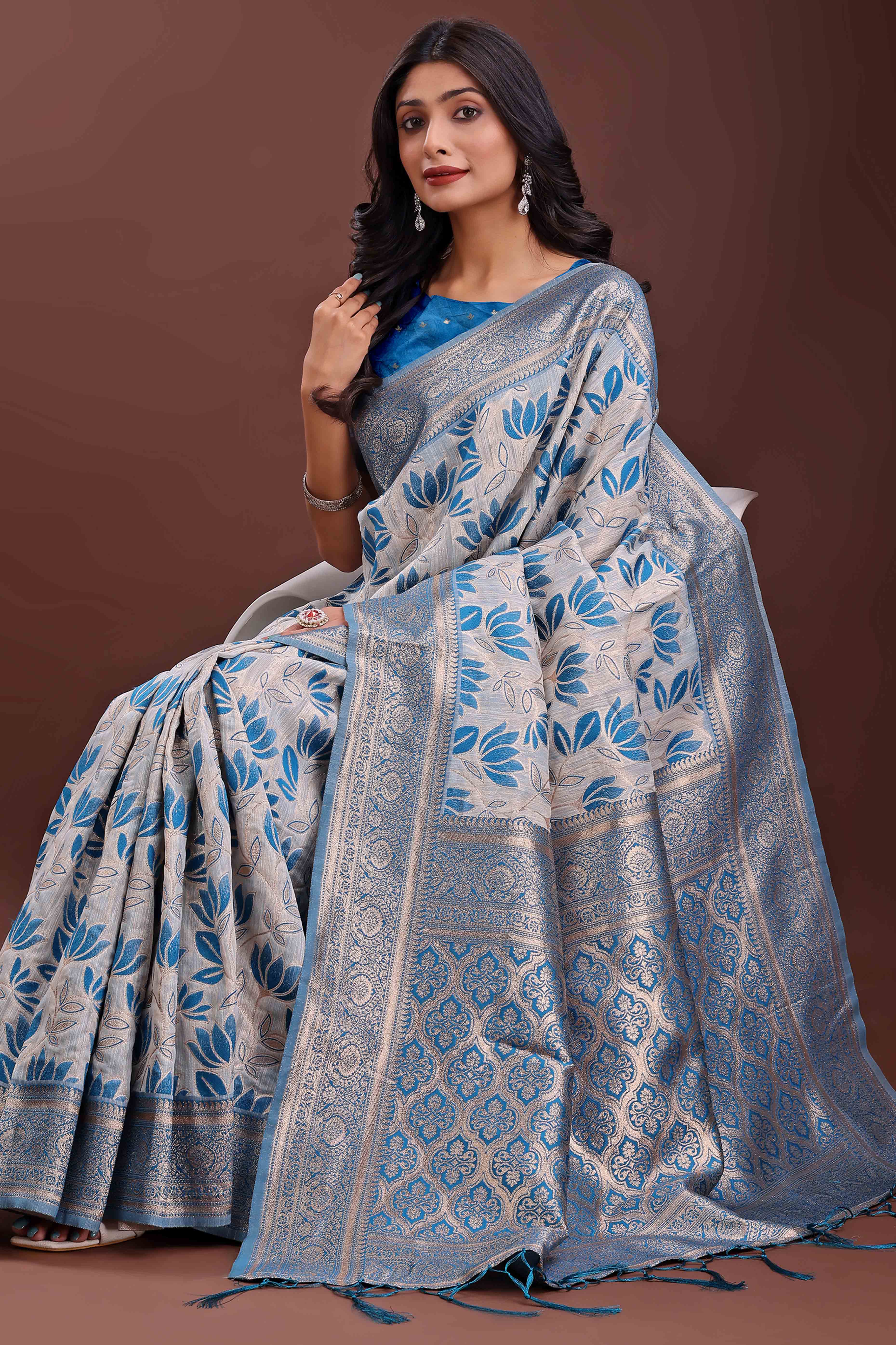 Blue Linen Cotton Saree Featuring Graceful Floral Patterns in Zari Weave