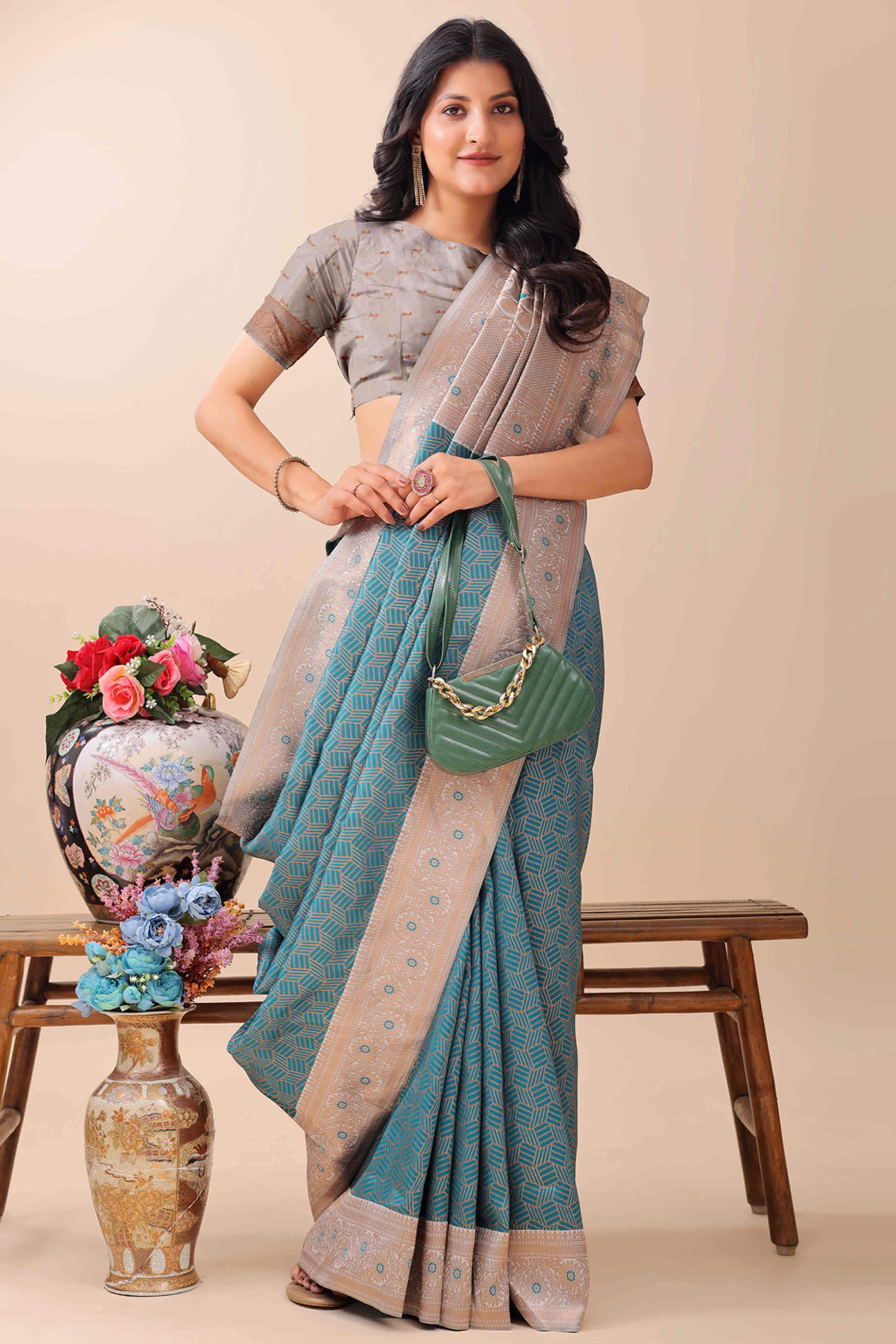 Teal Lichi Cotton Silk Saree With Intricate Zari Weaving In Floral & Geometric Patterns