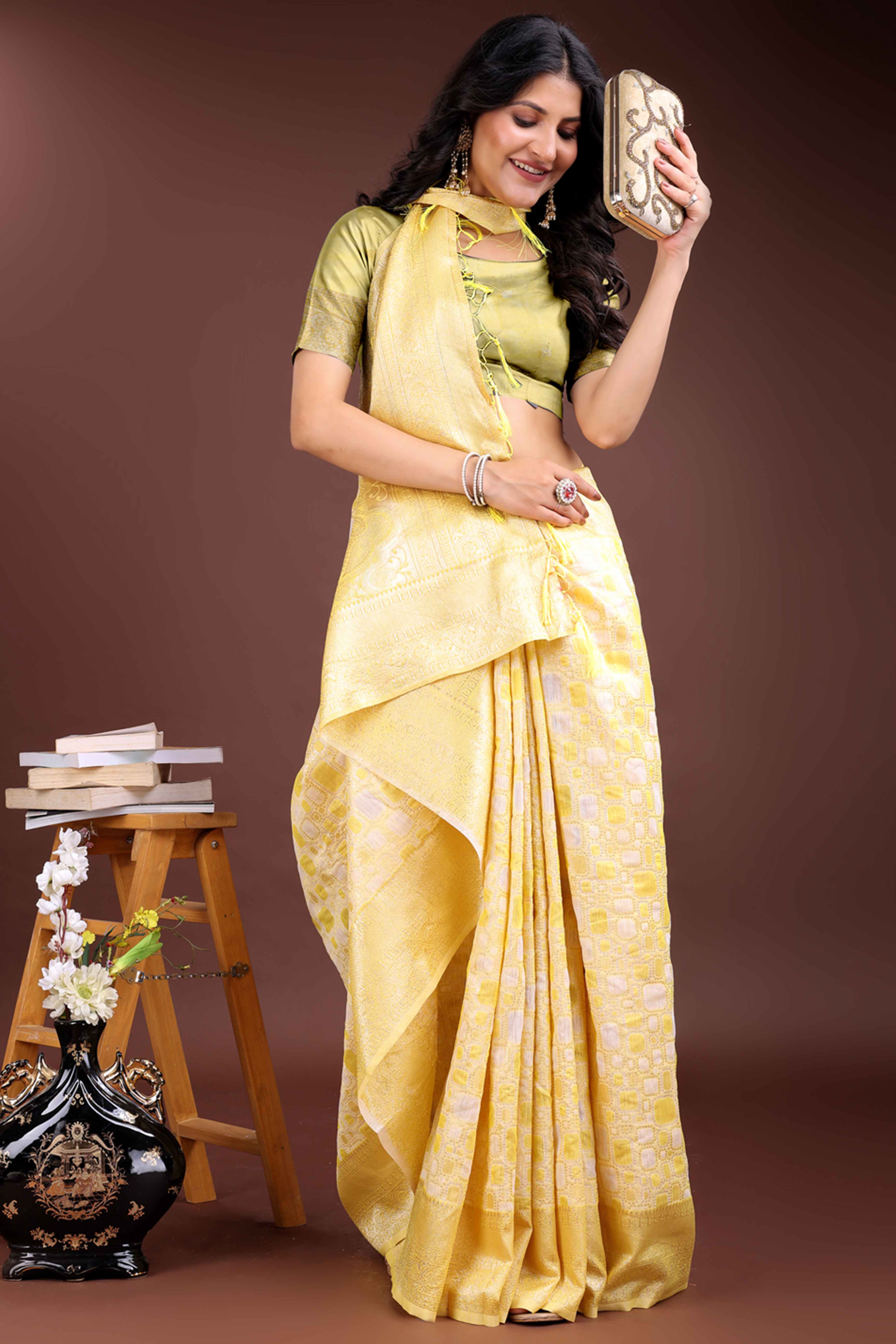 Radiant Yellow Geometric Style Zari Weaving Cotton Blend Saree Accented with Vibrant Tassels