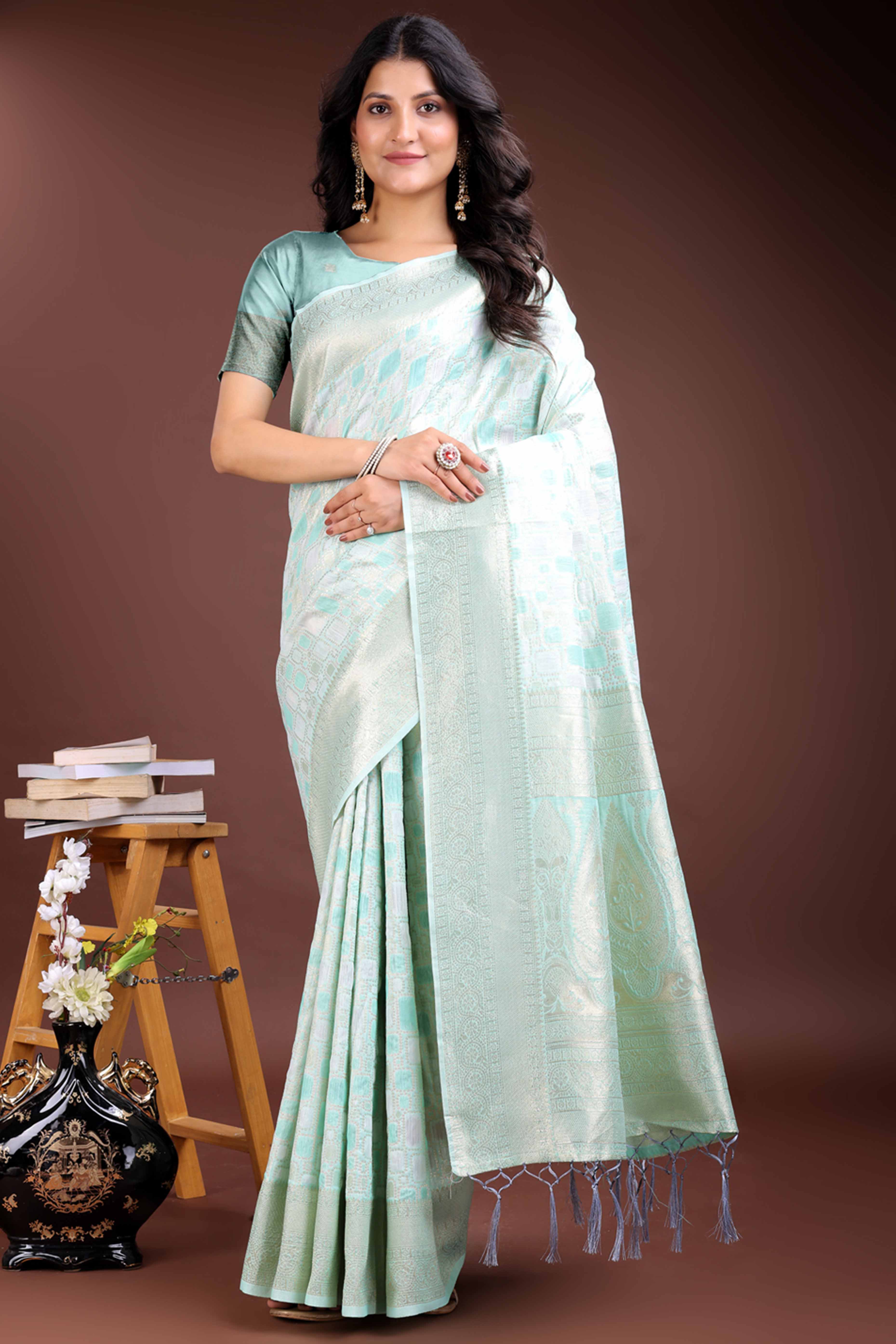 Serene Sea Green Geometric Style Zari Weaving Cotton Blend Saree Featuring Artistic Tassels