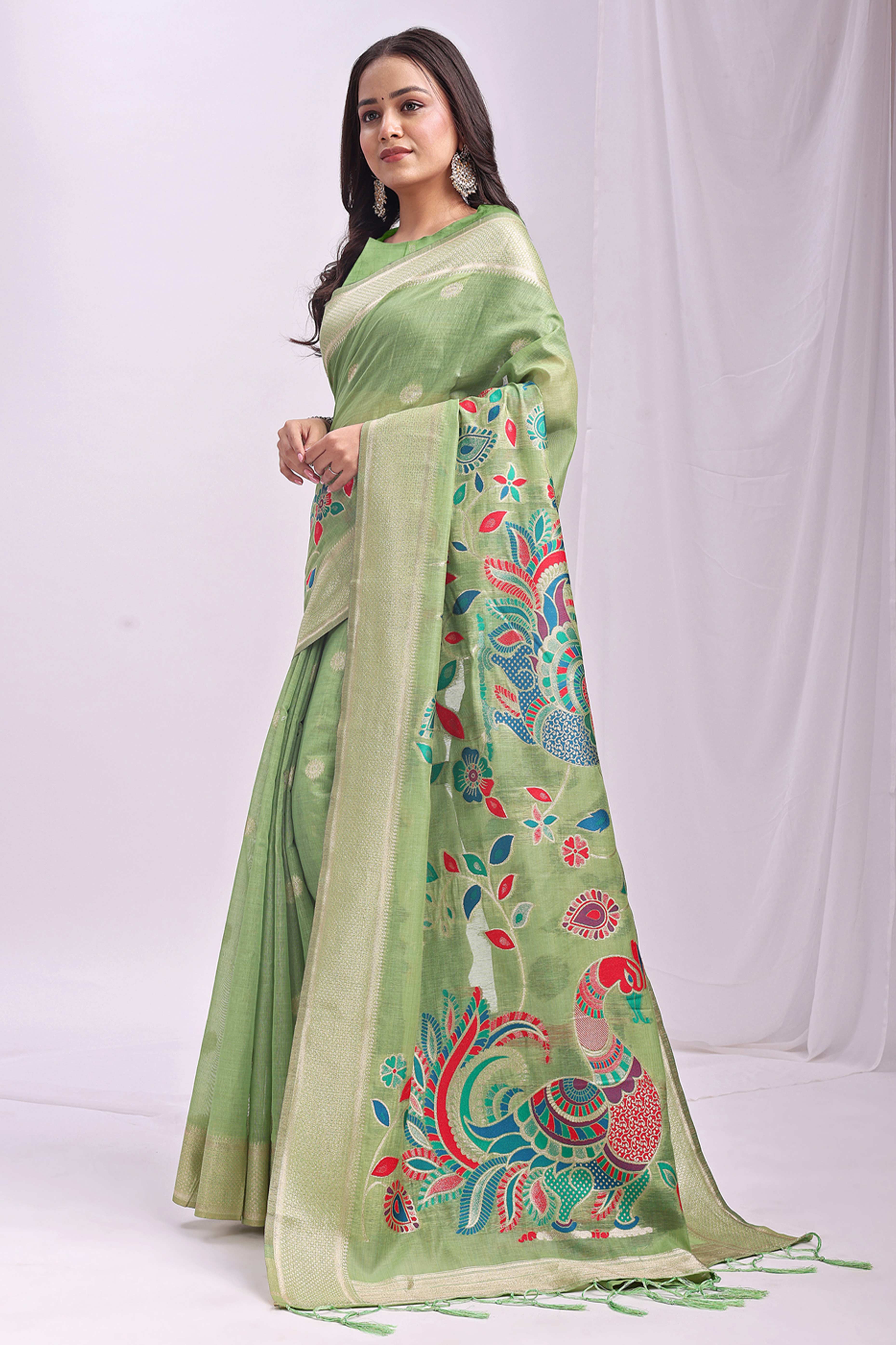 Light Green Floral Woven Linen Cotton Saree Accented With Peacock Motif Pallu & Zari Border