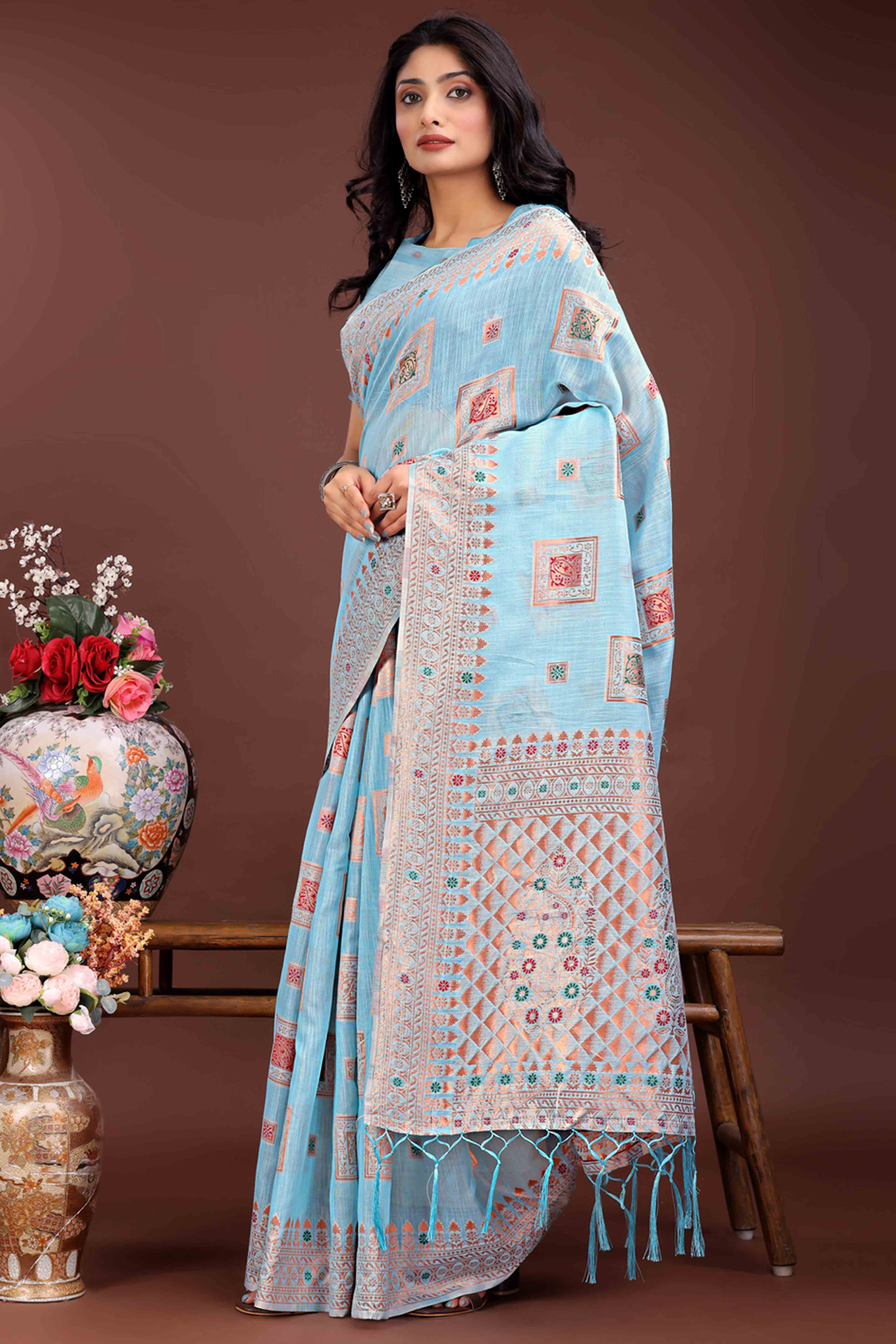 Elegant Floral Zari Weaving Embellished Sky Blue Saree In Linen Cotton with Tassel Accents