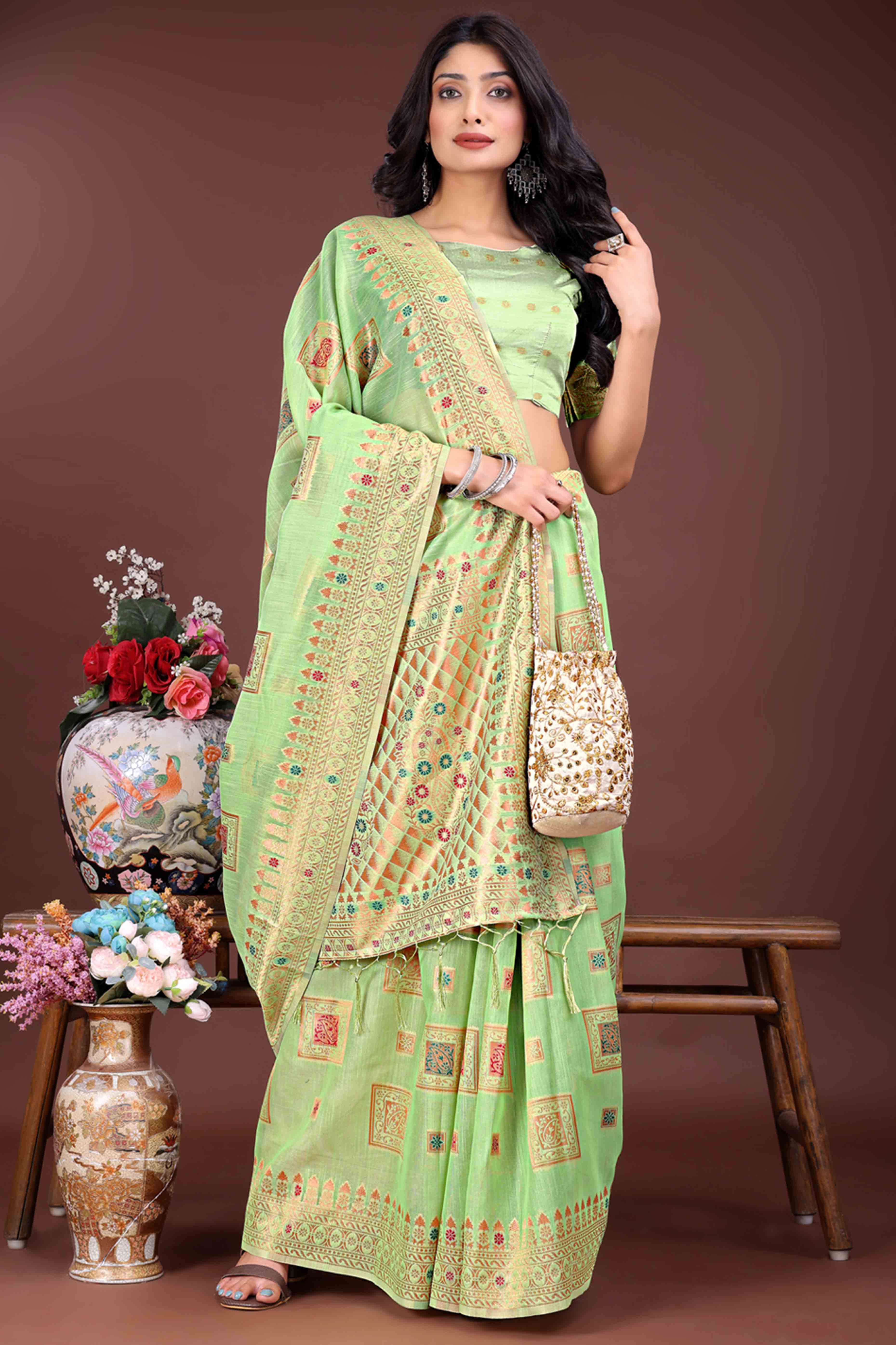 Sophisticated Floral Zari Weaving Embellished Green Saree In Linen Cotton with Tassel Accents