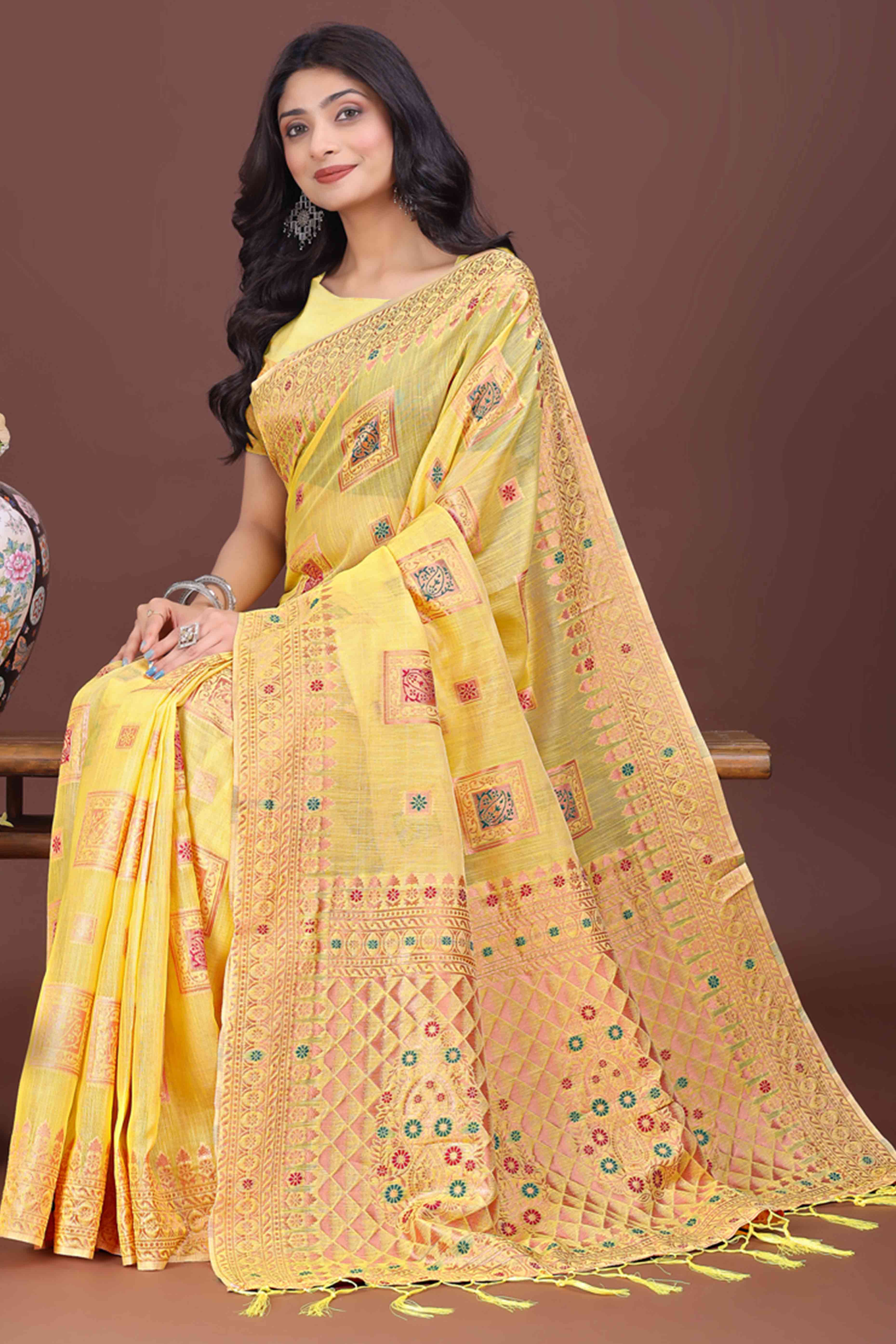 Dazzling Floral Zari Weaving Embellished Yellow Saree In Linen Cotton with Tassel Accents