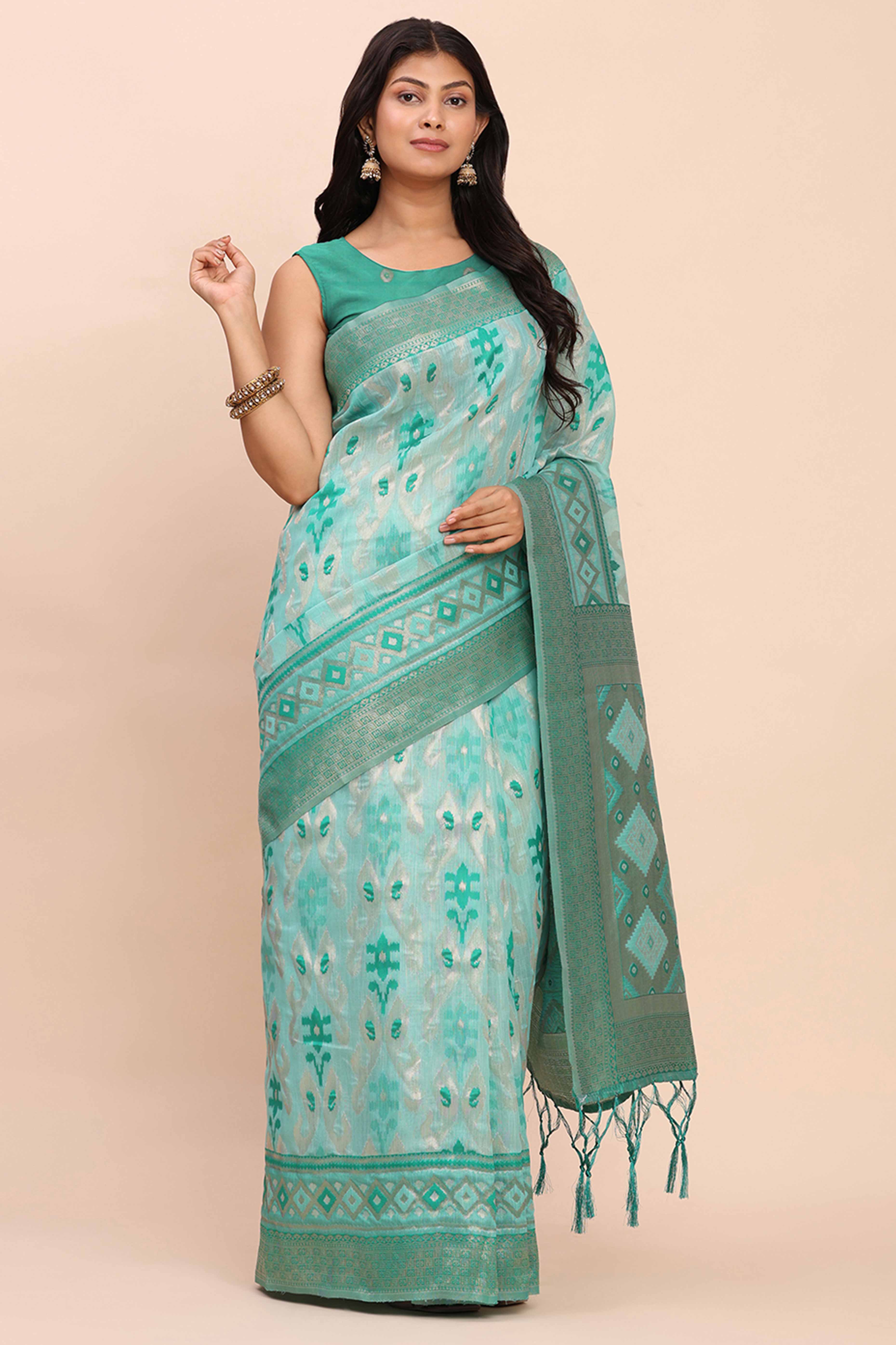 Turquoise Patola Inspired Linen Cotton Saree Adorned With Zari Weaving & Graceful Tassel Pallu