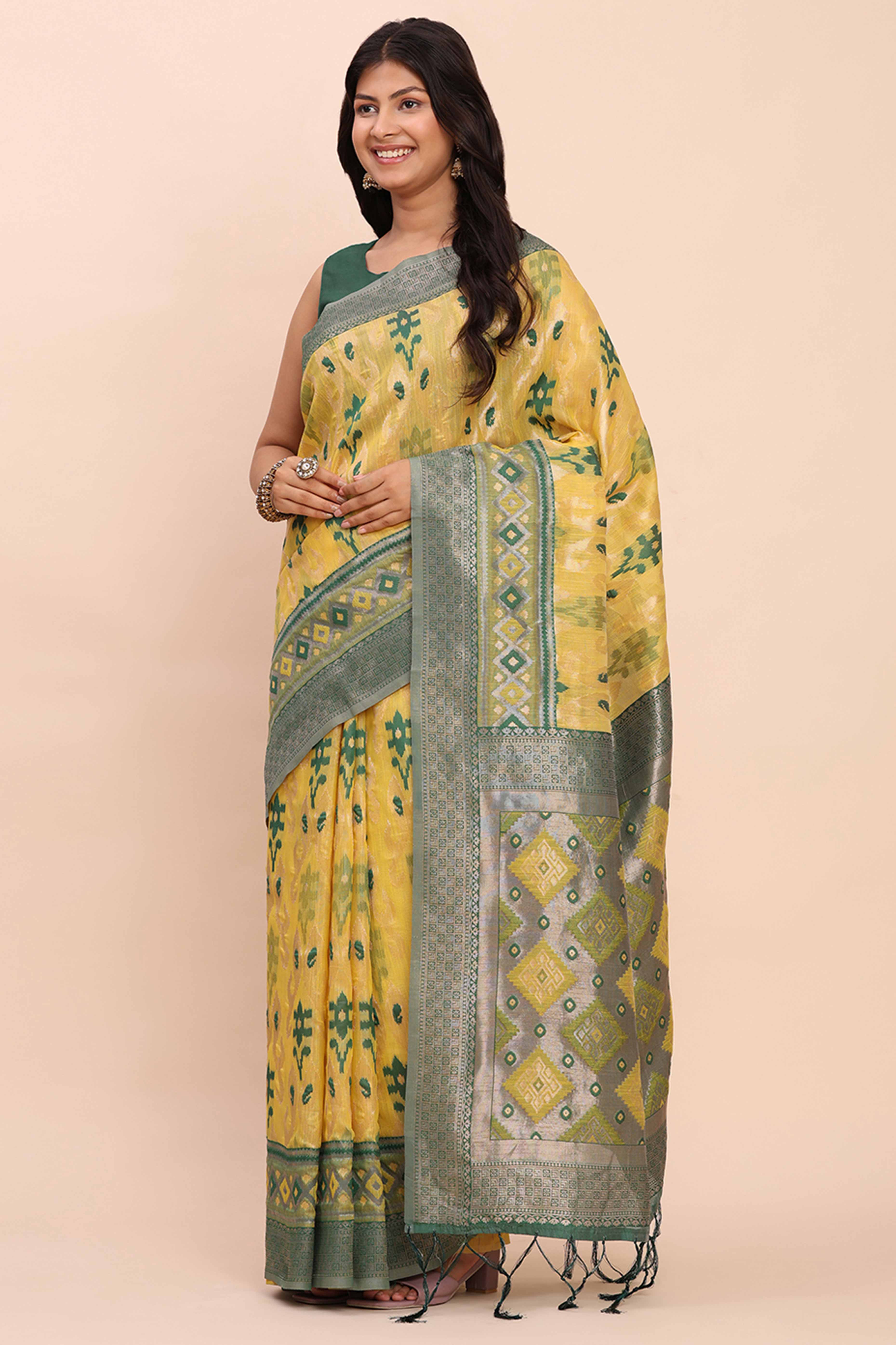 Yellow Patola Inspired Linen Cotton Saree Adorned With Zari Weaving & Graceful Tassel Pallu