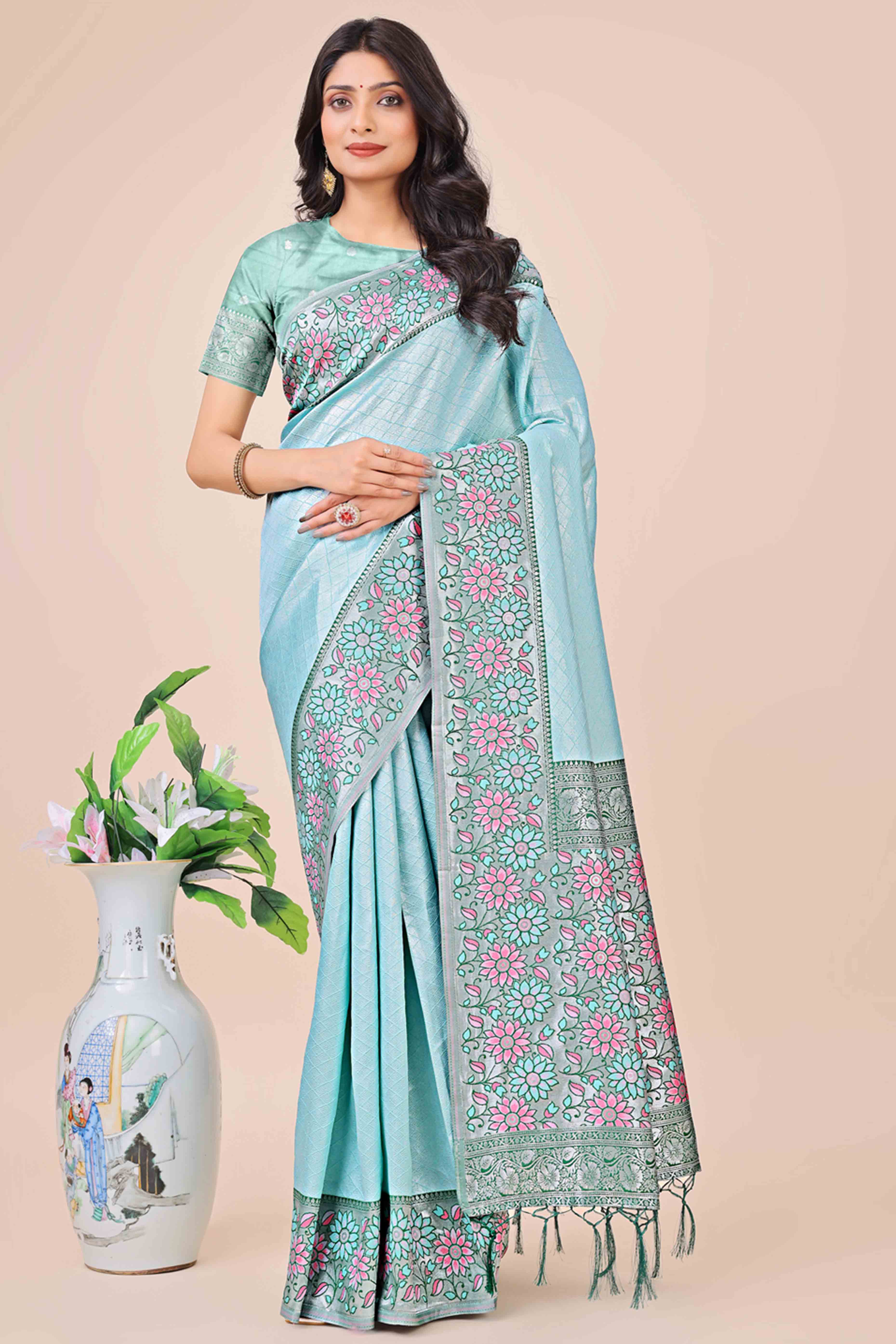 Light Blue Lichi Silk Blend Saree With Exquisite Floral Weaving & Graceful Tassel Details