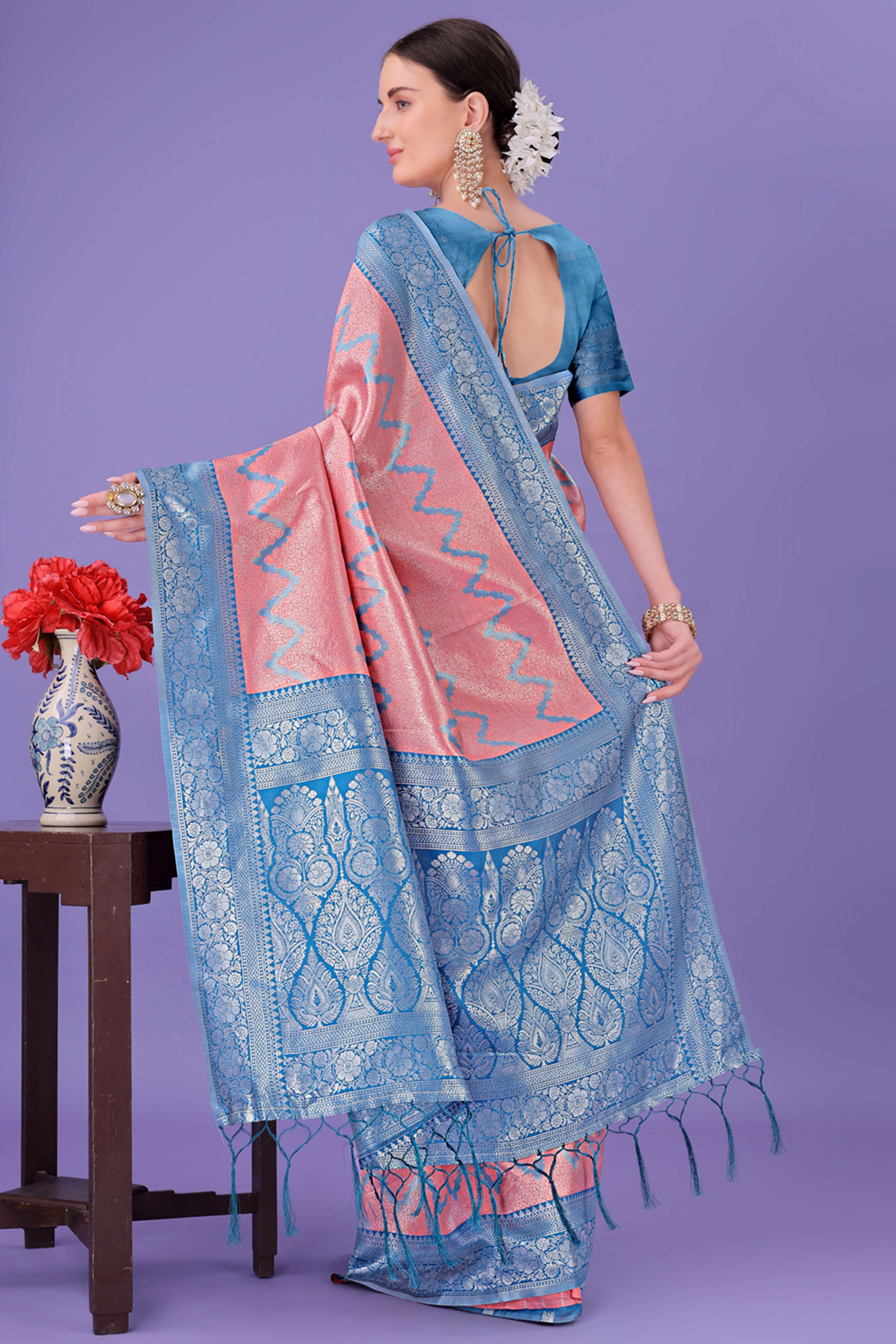 Peach Lichi Cotton Silk Saree Adorned With Floral Zari Weave & Tassels