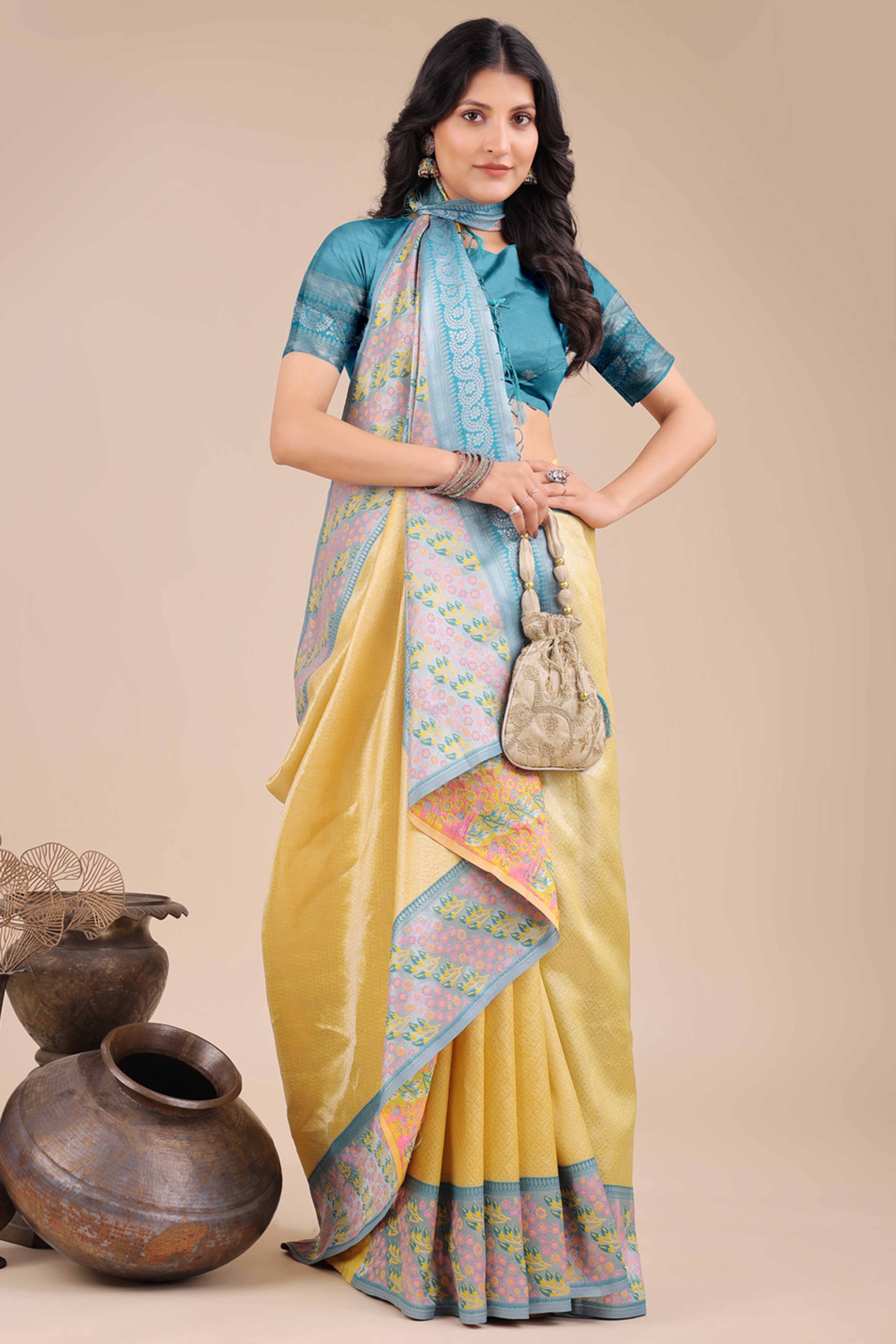 Yellow Silk Blend Saree Embellished With Zari Weaving & Tassel Accents