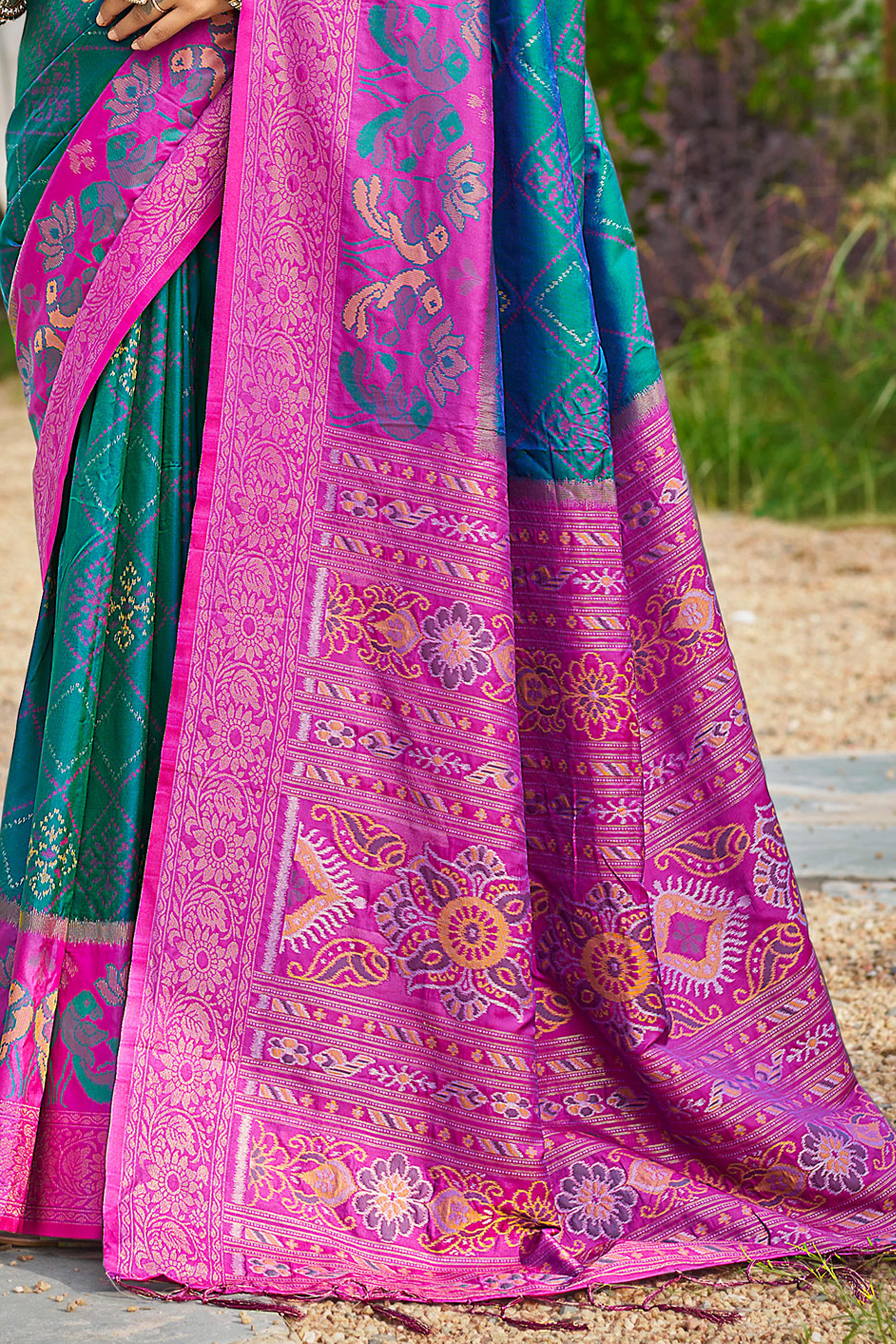 Graceful Morpich Blue Pochampally Silk Blend Saree Adorned With Floral Weaving & Tassel Pallu