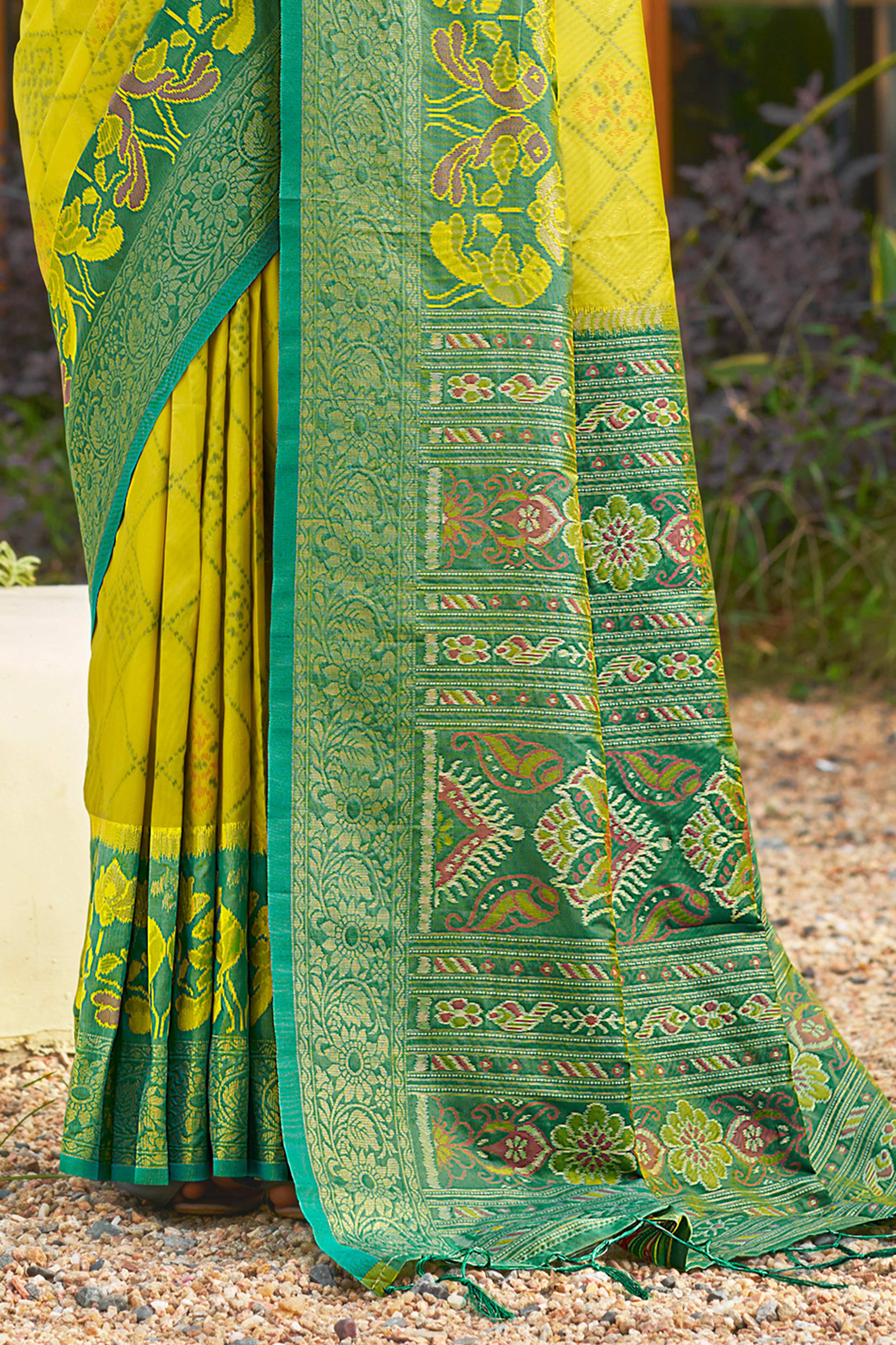 Graceful Lemon Yellow Pochampally Silk Blend Saree Adorned With Floral Weaving & Tassel Pallu