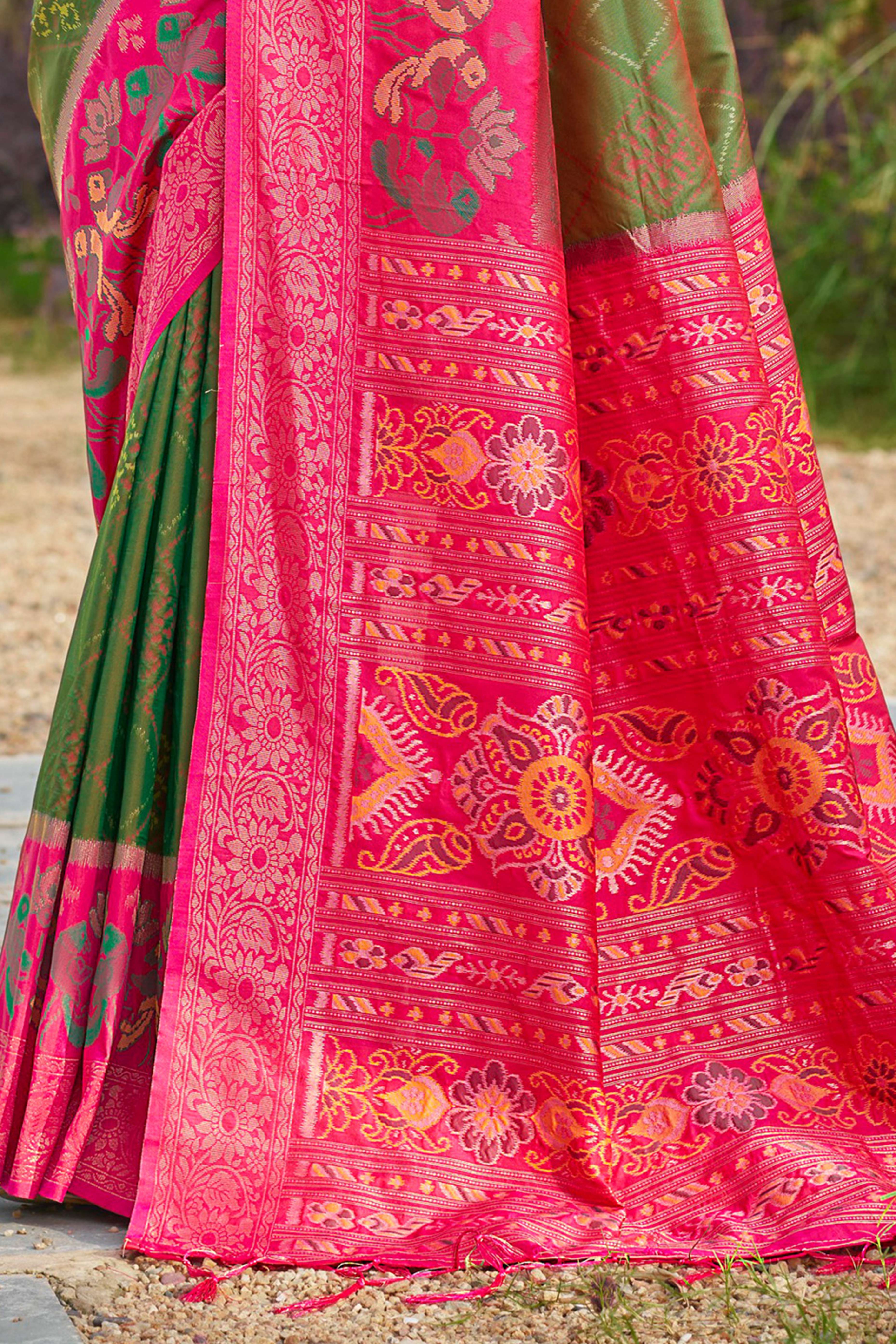 Graceful Mehendi Green Pochampally Silk Blend Saree Adorned With Floral Weaving & Tassel Pallu