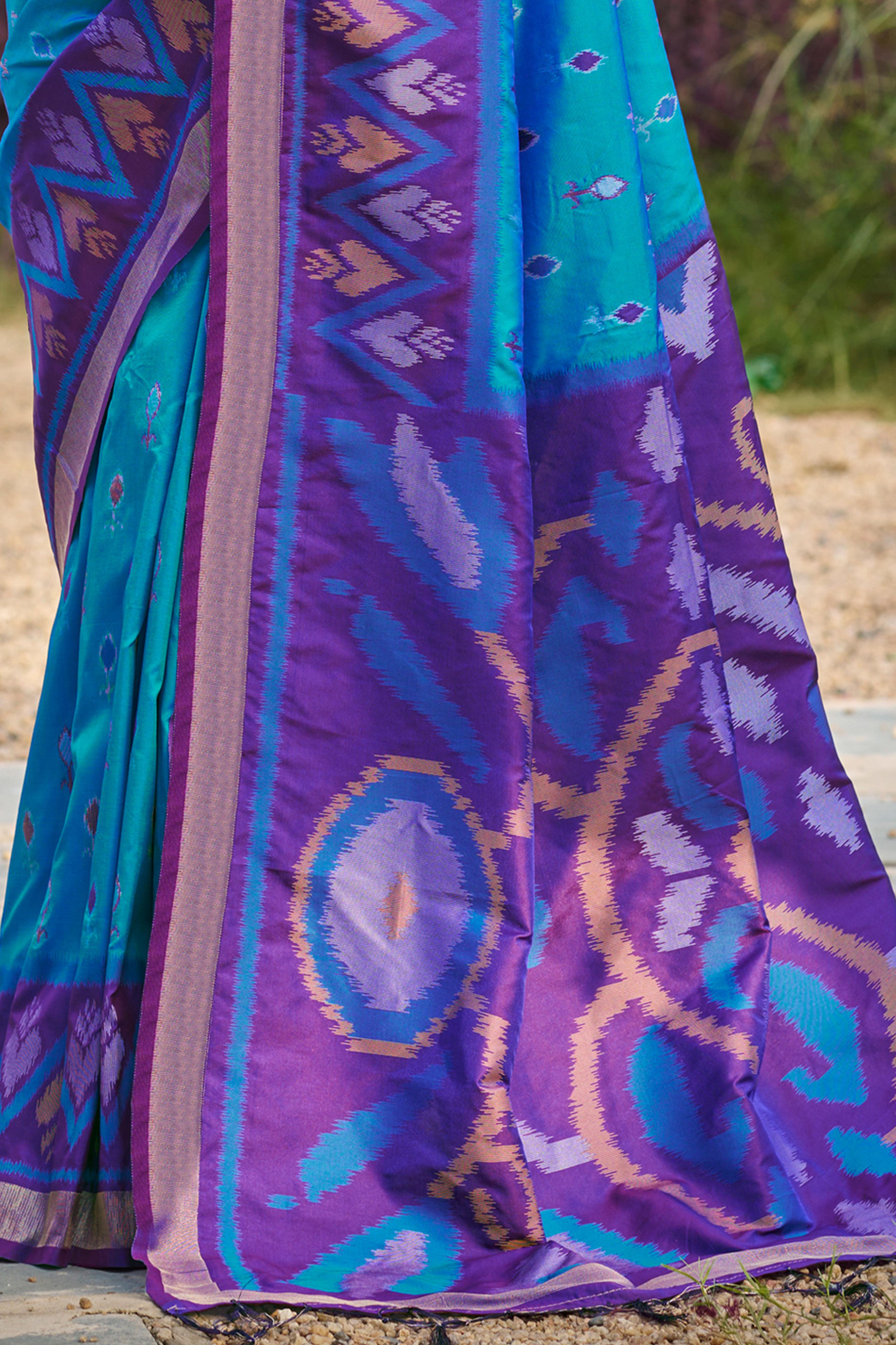 Elegant Blue Pochampally Ikkat Silk Blend Saree Featuring Intricate Weaving & Tassel Pallu