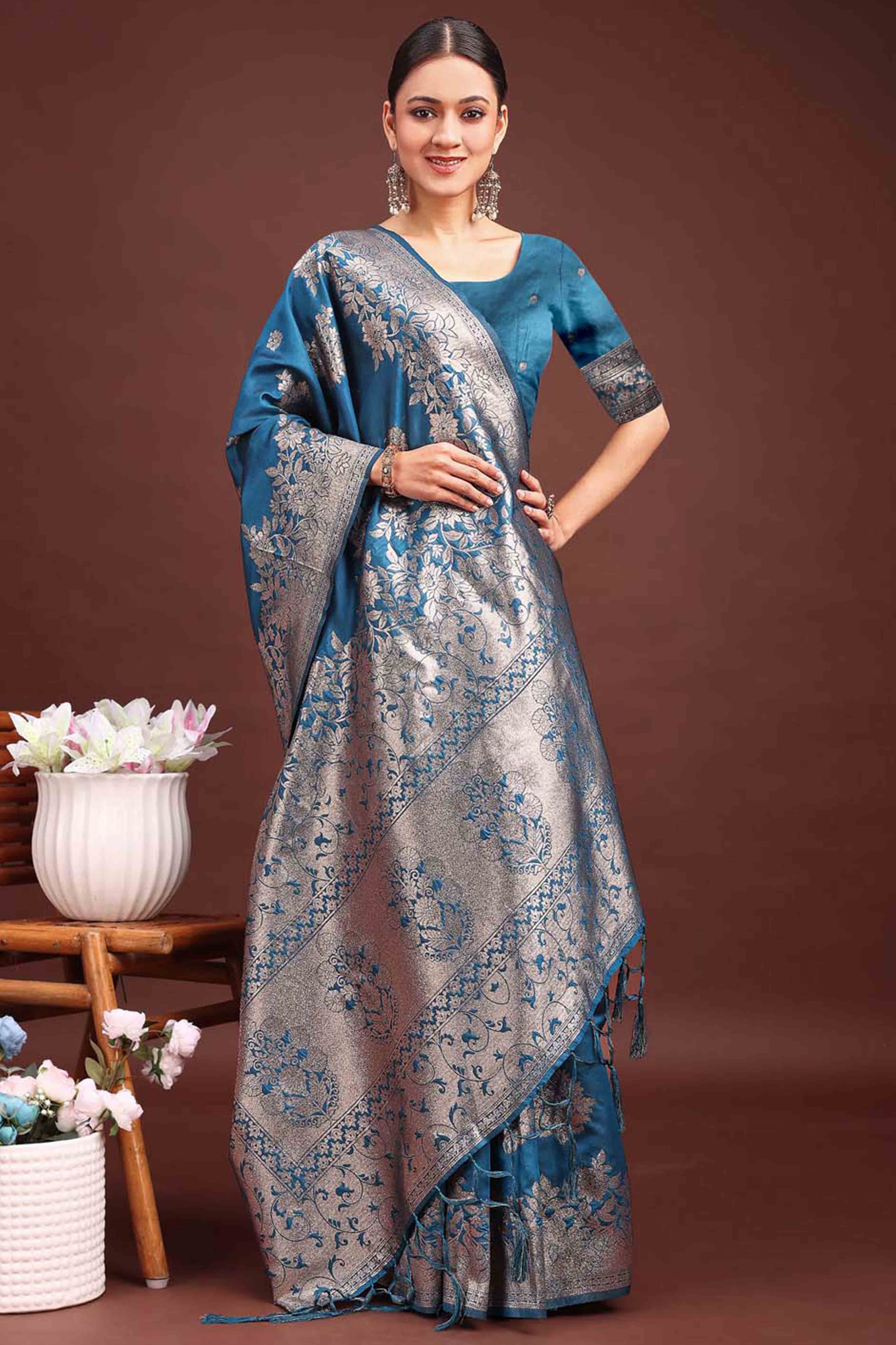 Deep Teal Blue Banarasi Silk Saree With Floral Zari Weaving & Elegant Tassels