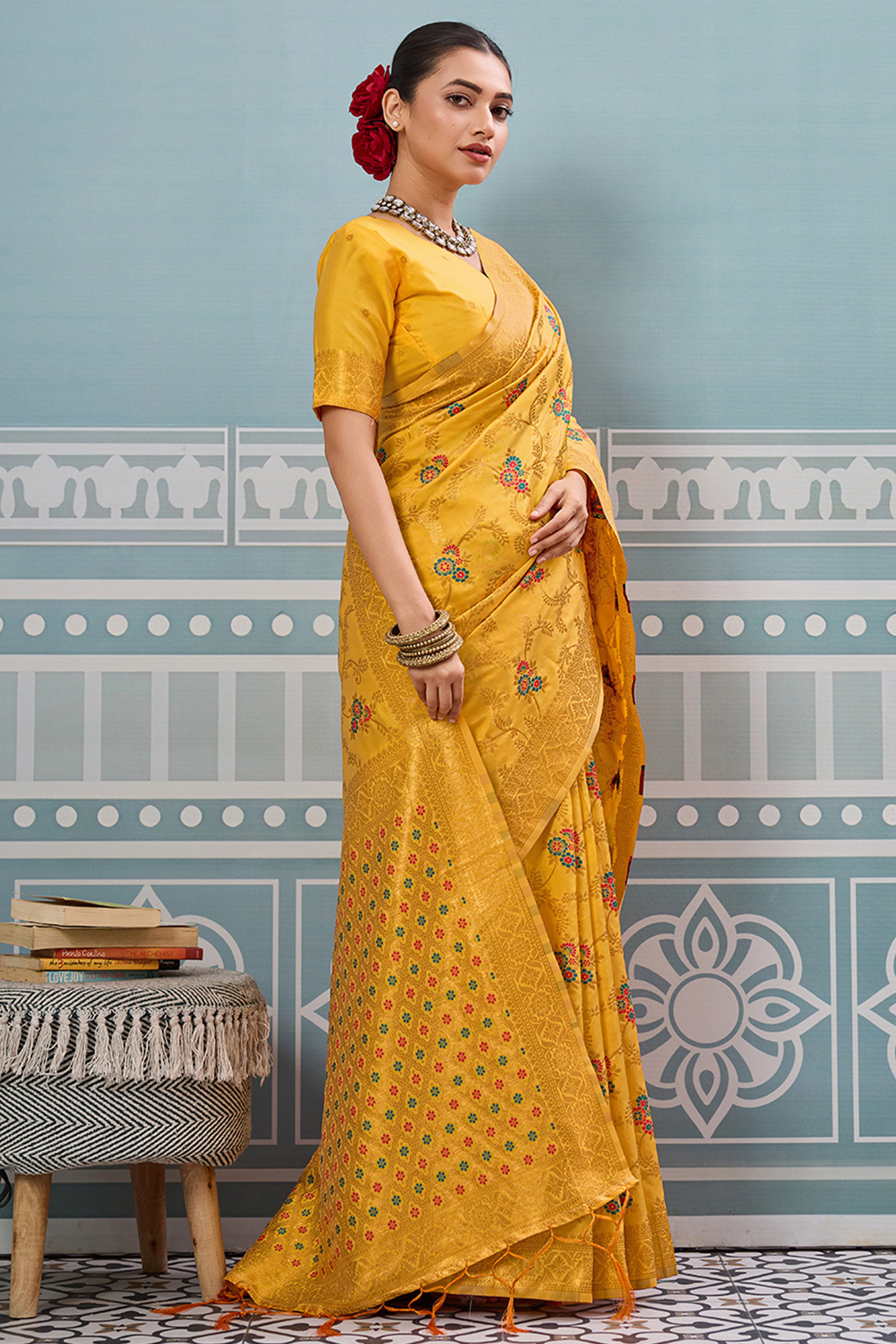 Majestic Bloom Yellow Floral Zari Weaving Silk Blend Saree With Elegant Tassel Pallu