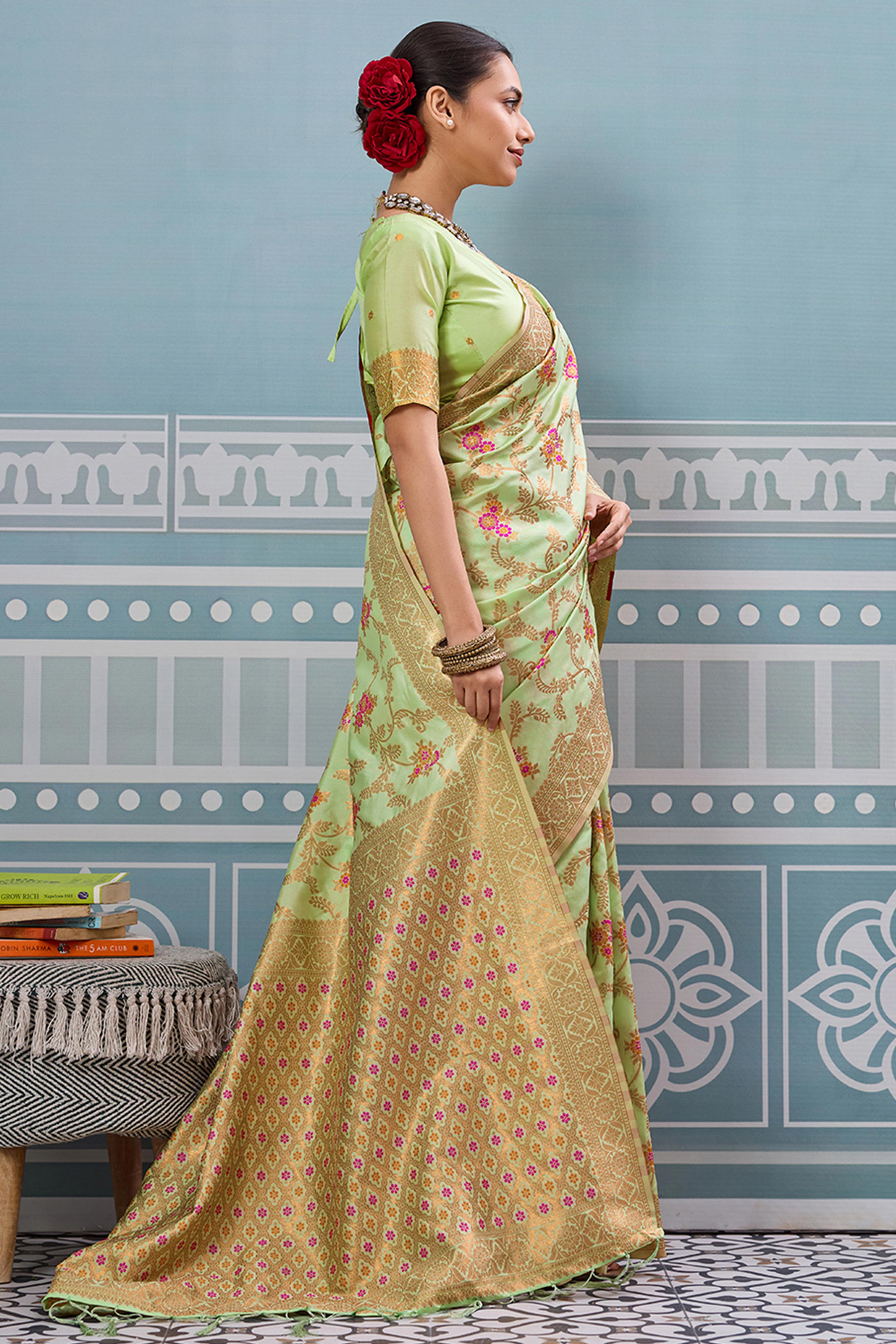 Majestic Bloom Pista Green Floral Zari Weaving Silk Blend Saree With Elegant Tassel Pallu