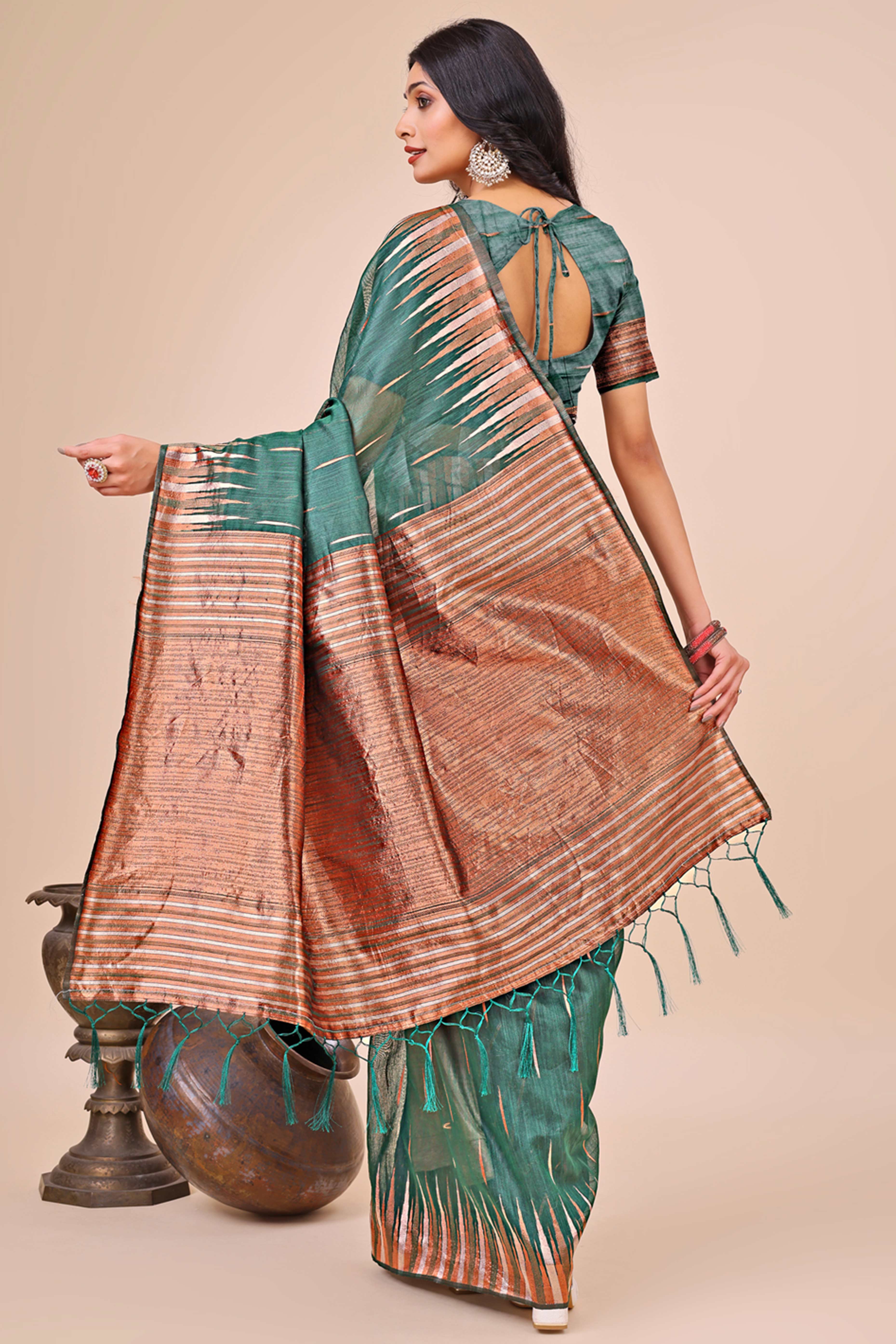 Green Saree In Linen Cotton With Exquisite Zari Weaving & Subtle Tassel Border