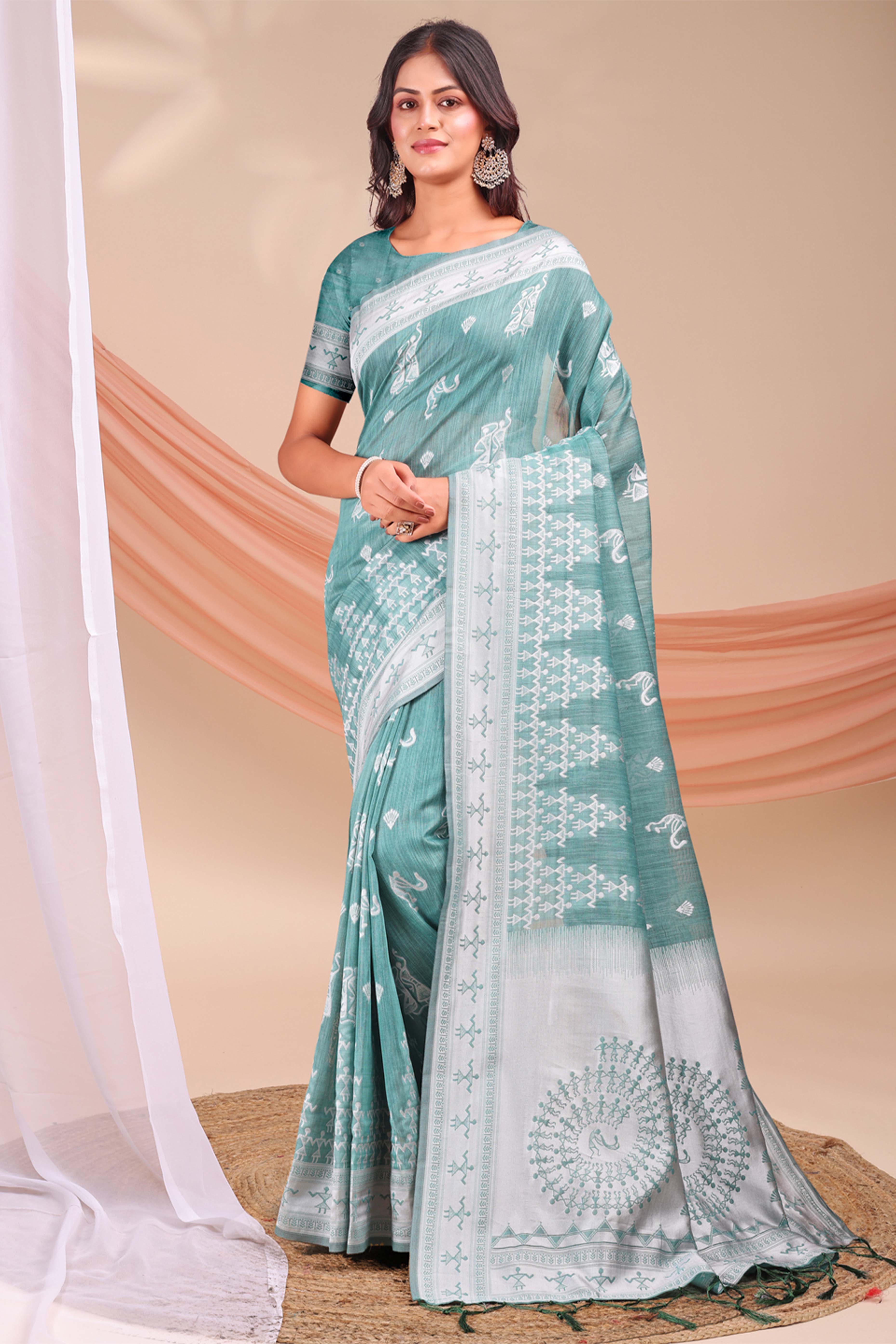 Sea Green Ethnic Saree in Soft Linen Cotton Fabric Featuring Warli Art Weaving