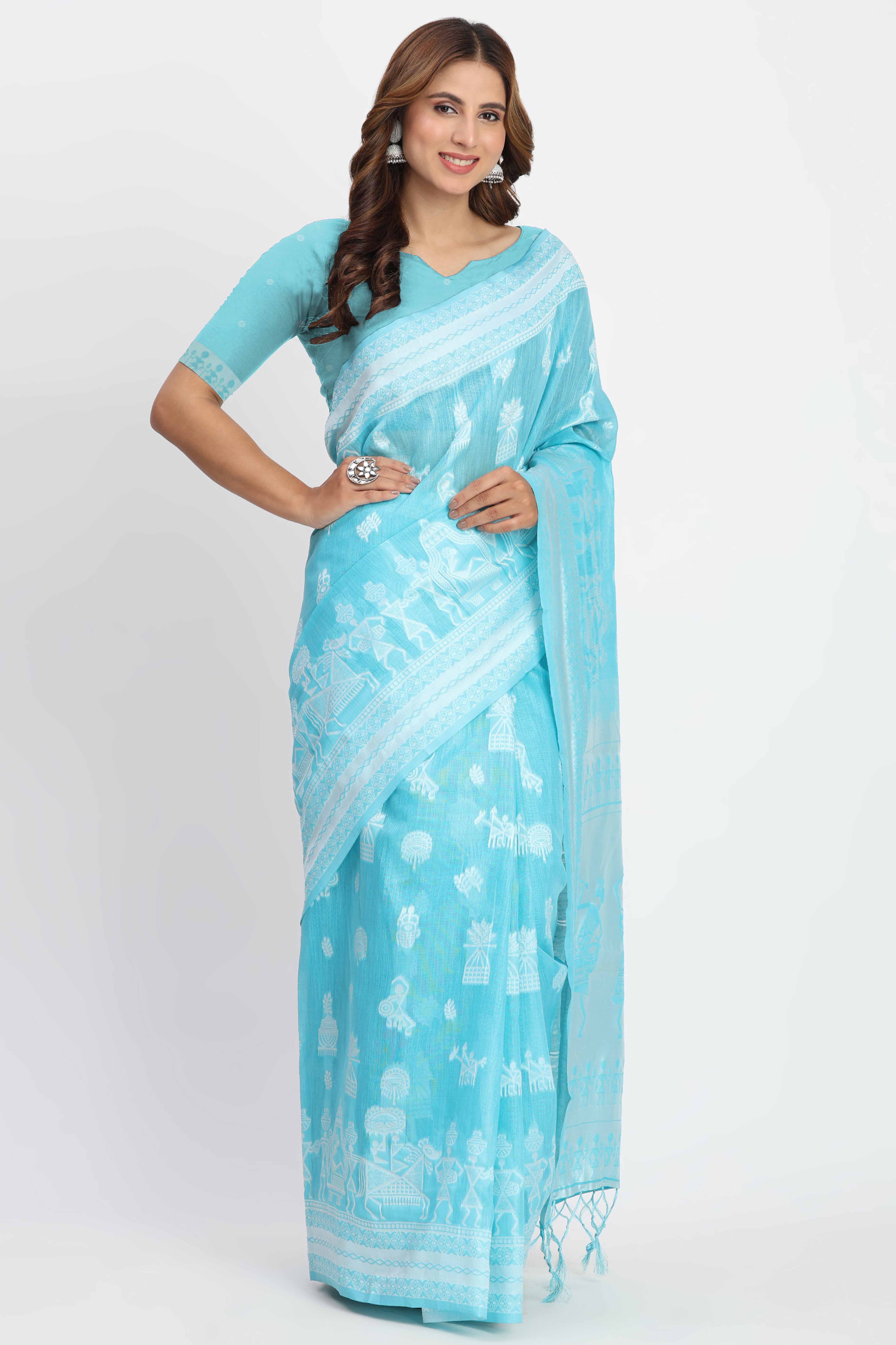 Blue Linen Cotton Saree Showcasing Traditional Warli Motifs In Zari Weaving With Tassel Pallu