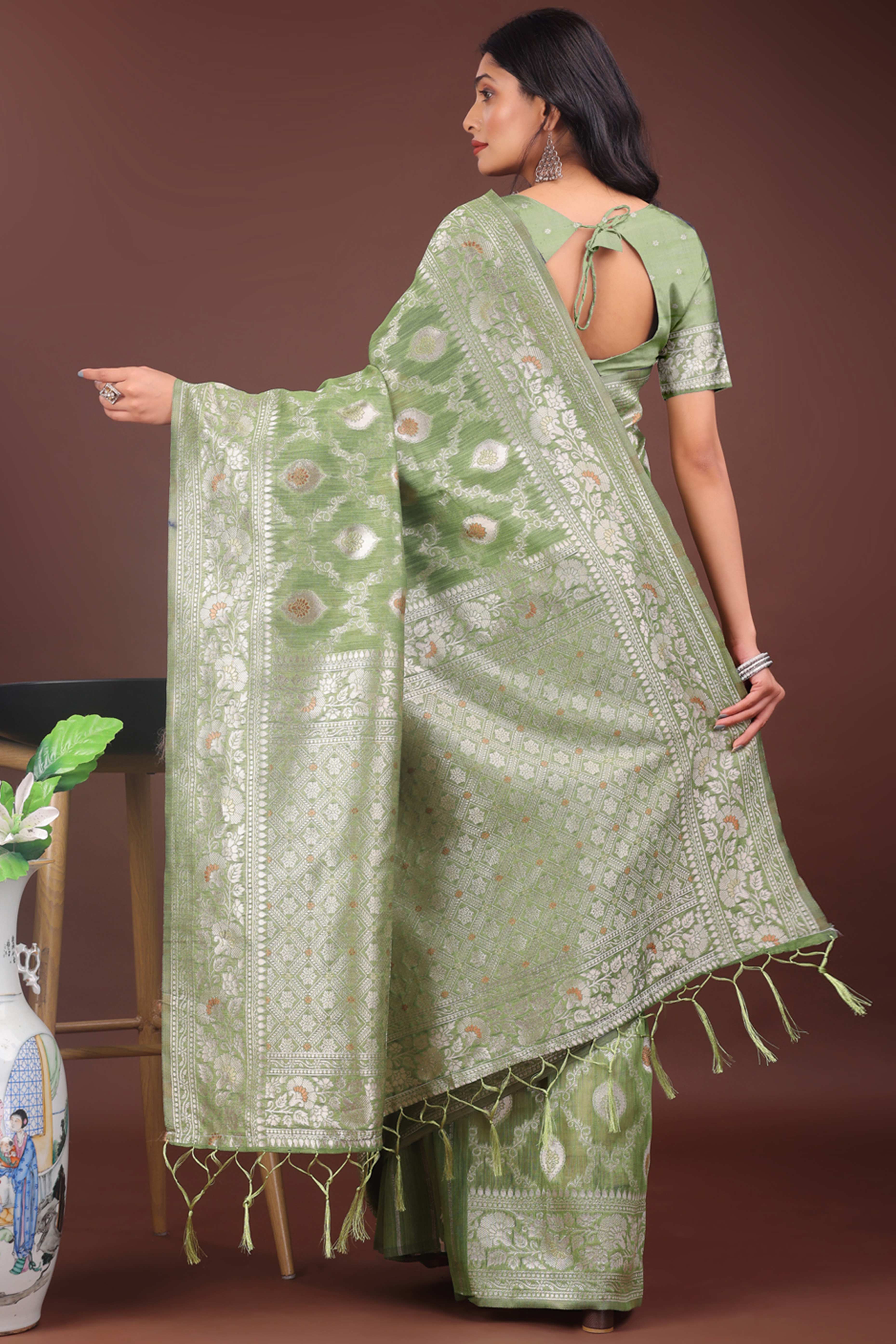 Light Green Cotton Blend Saree with Banarasi Style Floral Artistry and Tassels