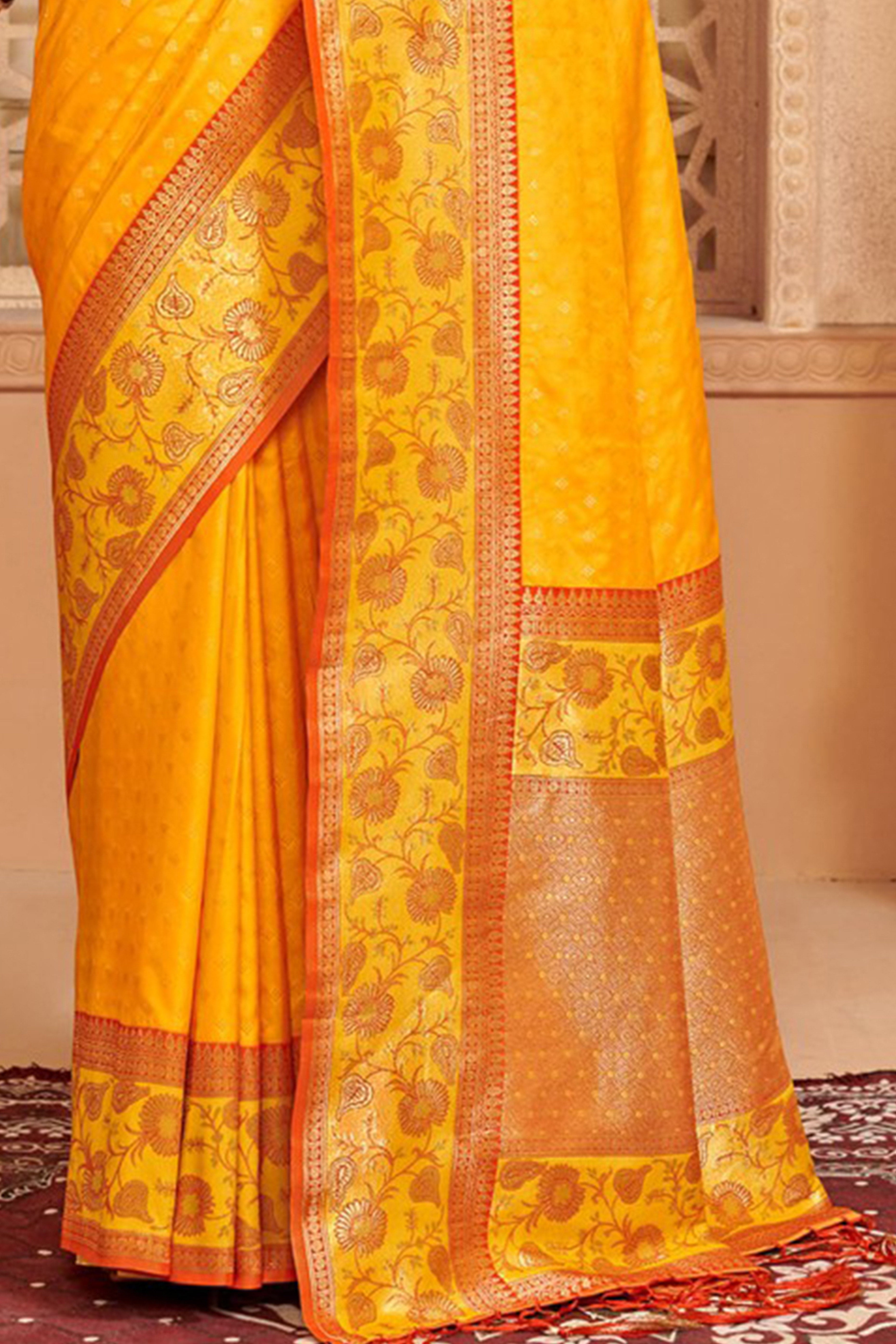 Elegant Yellow Floral Zari Weaving Silk Blend Saree With Tassel Pallu