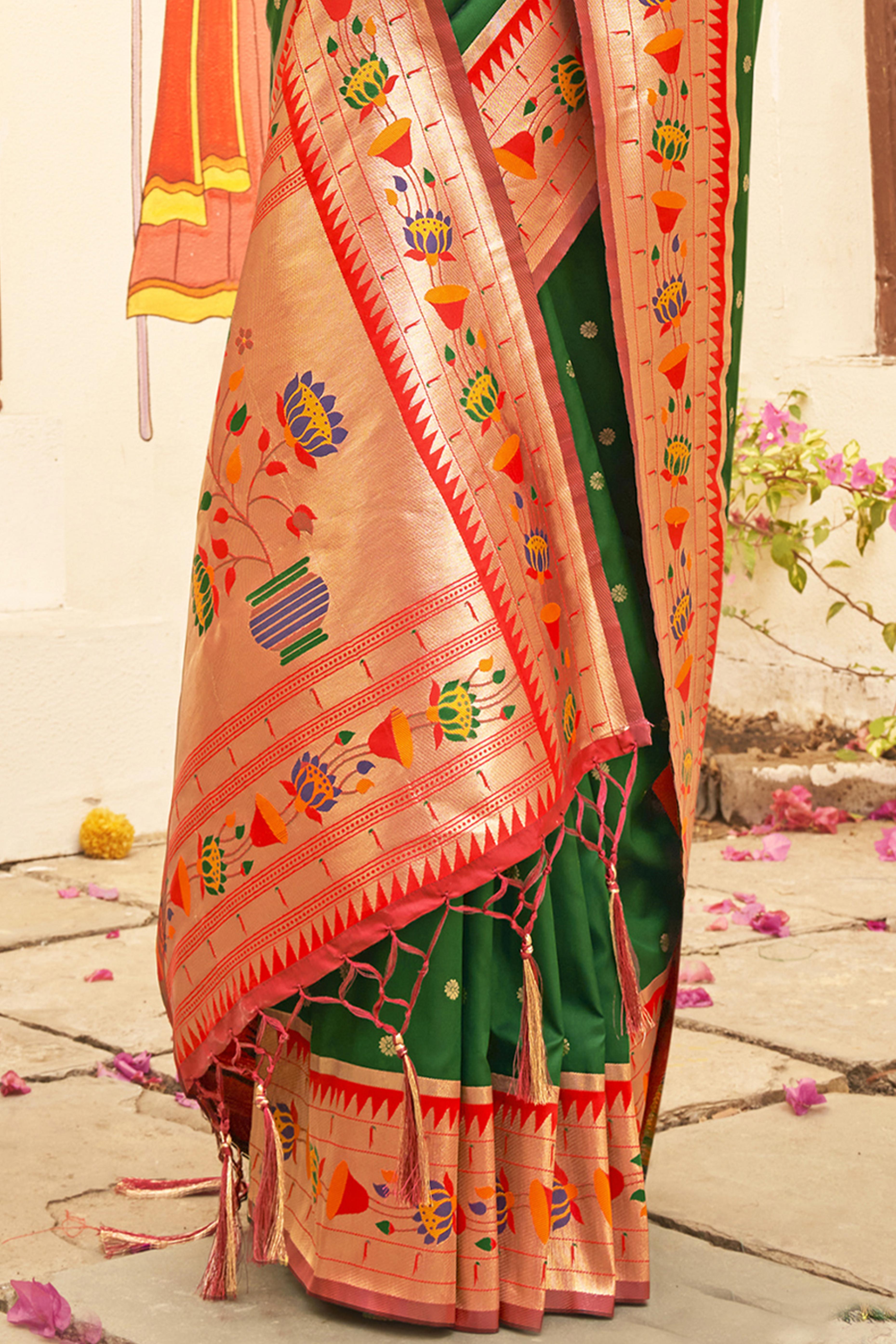 Charming Green Floral Zari Woven Silk Blend Saree With Stylish Tassel Pallu