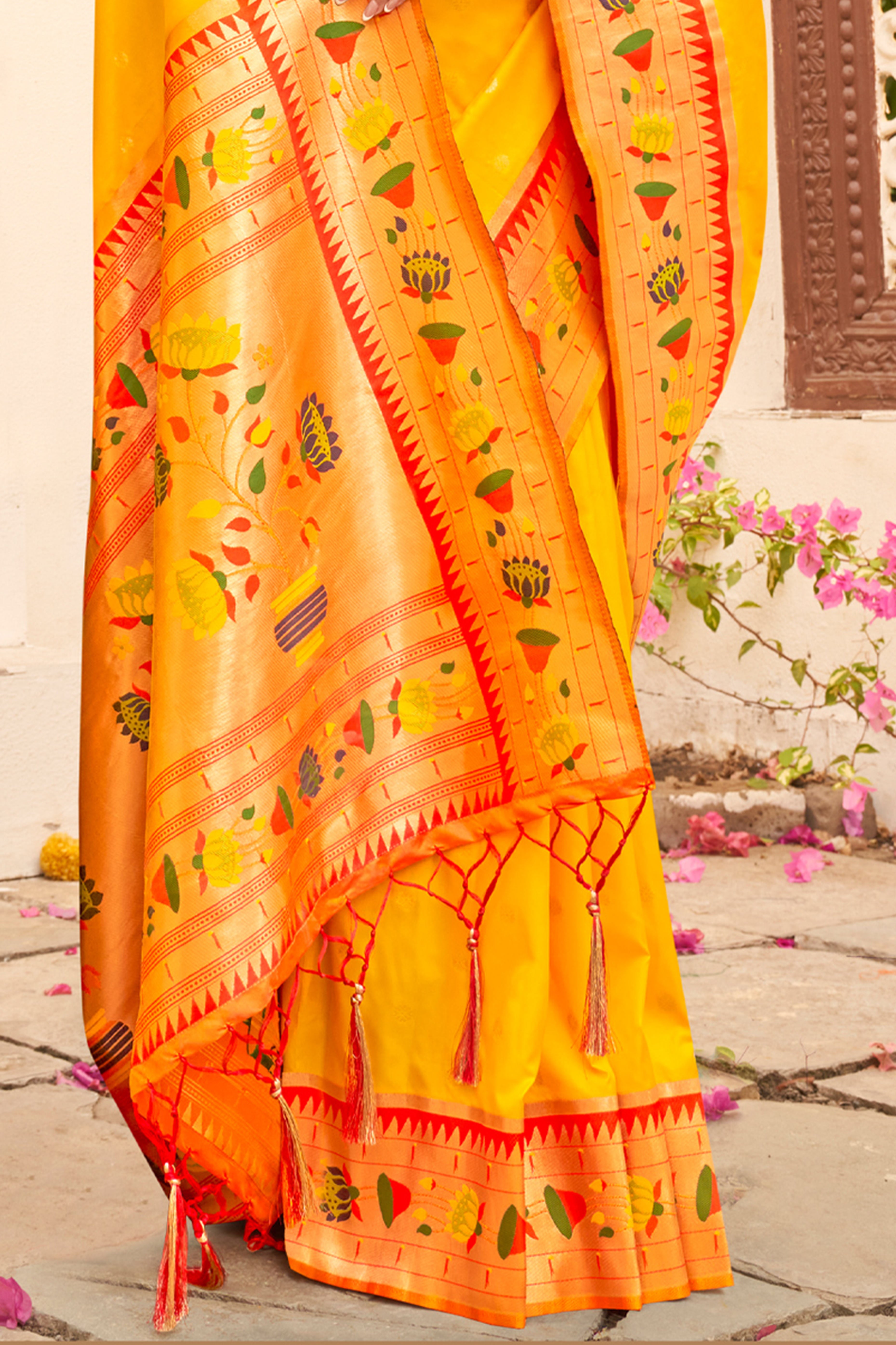 Charming Yellow Floral Zari Woven Silk Blend Saree With Stylish Tassel Pallu
