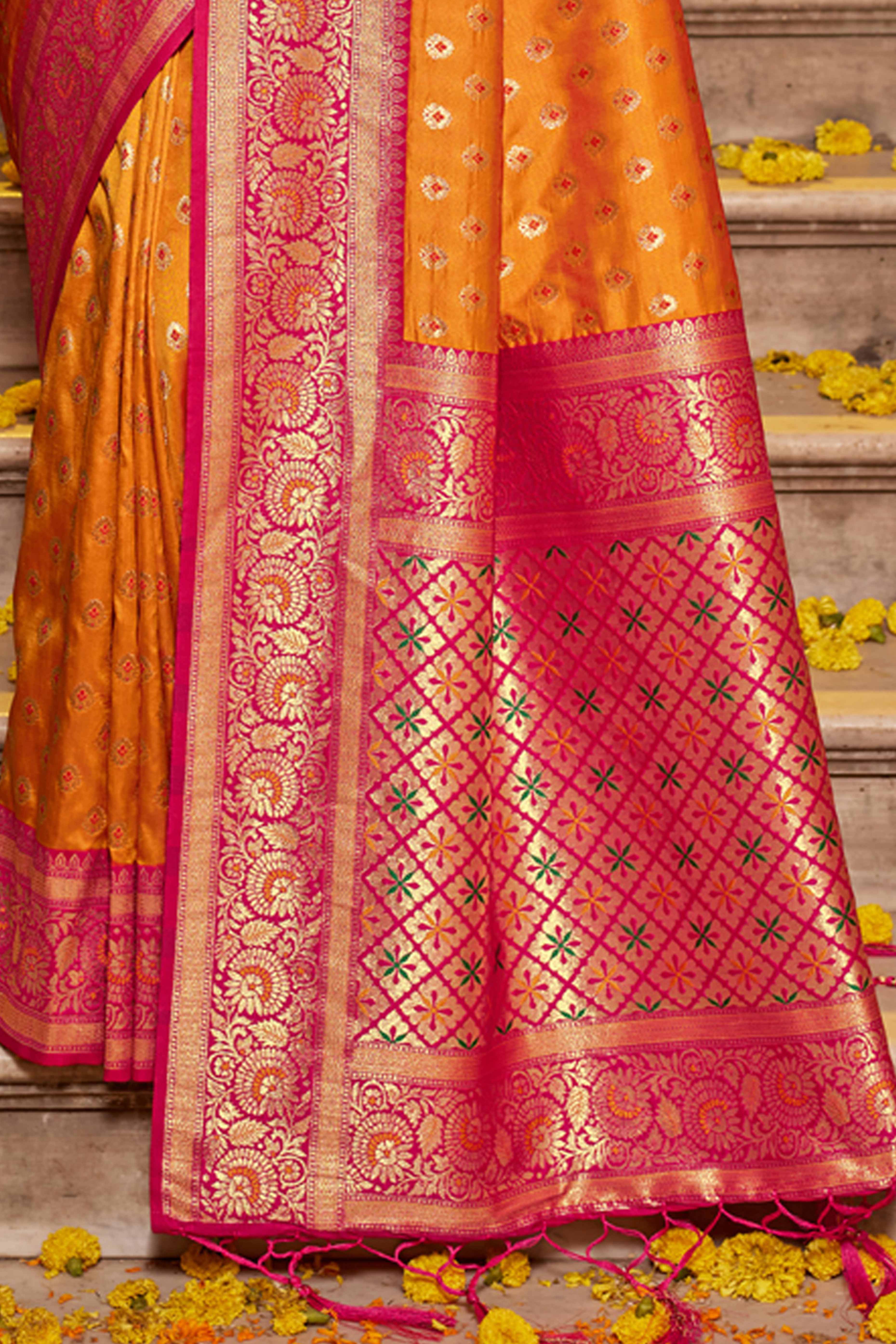 Orange Banarasi Silk Saree Featuring Intricate Floral Weaving & Elegant Tassel Pallu