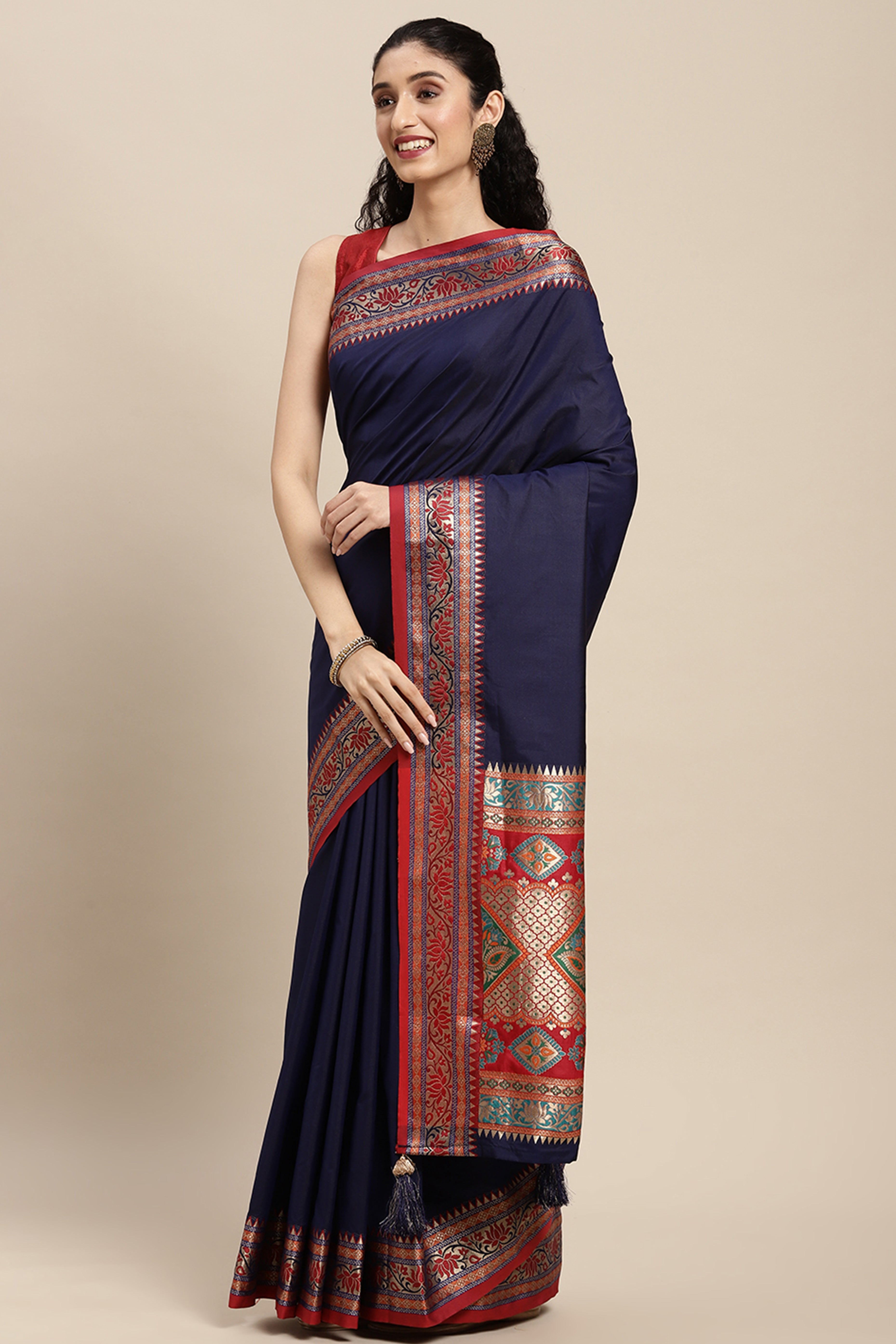 Graceful Navy Blue Solid Saree Highlighted With Floral Zari Weaving On Silk Blend & Tassel Pallu