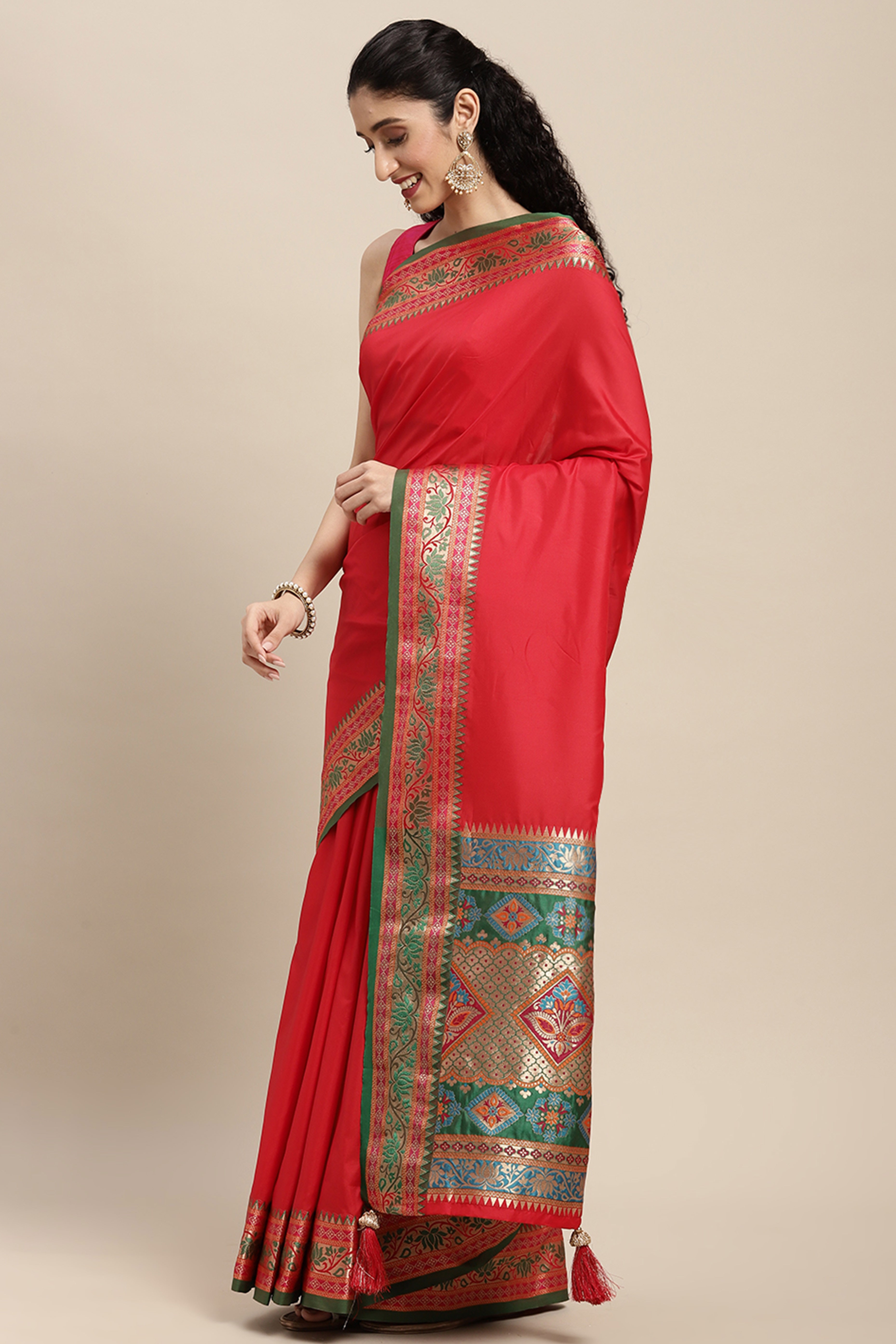 Graceful Red Solid Saree Highlighted With Floral Zari Weaving On Silk Blend & Tassel Pallu