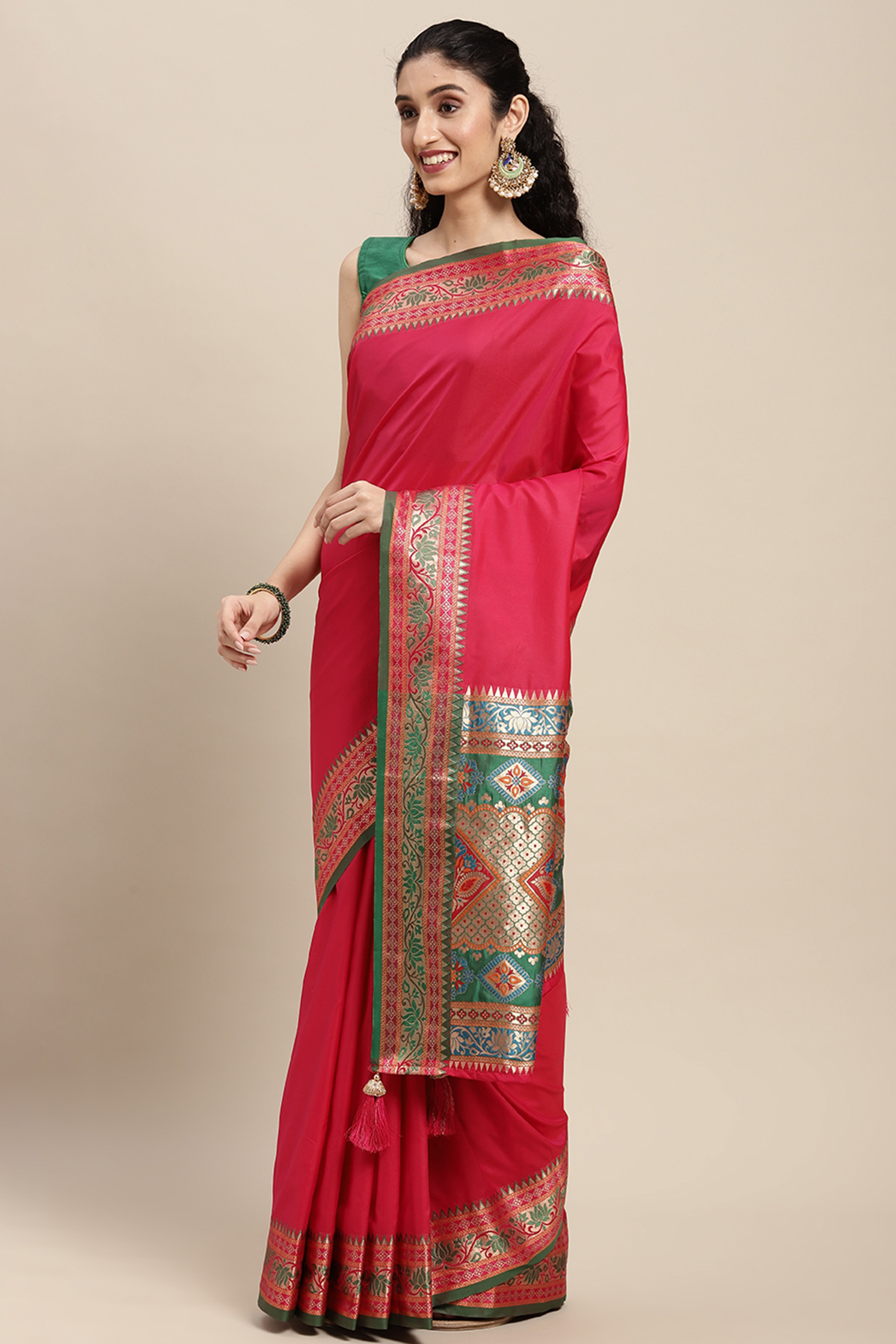 Graceful Pink Solid Saree Highlighted With Floral Zari Weaving On Silk Blend & Tassel Pallu
