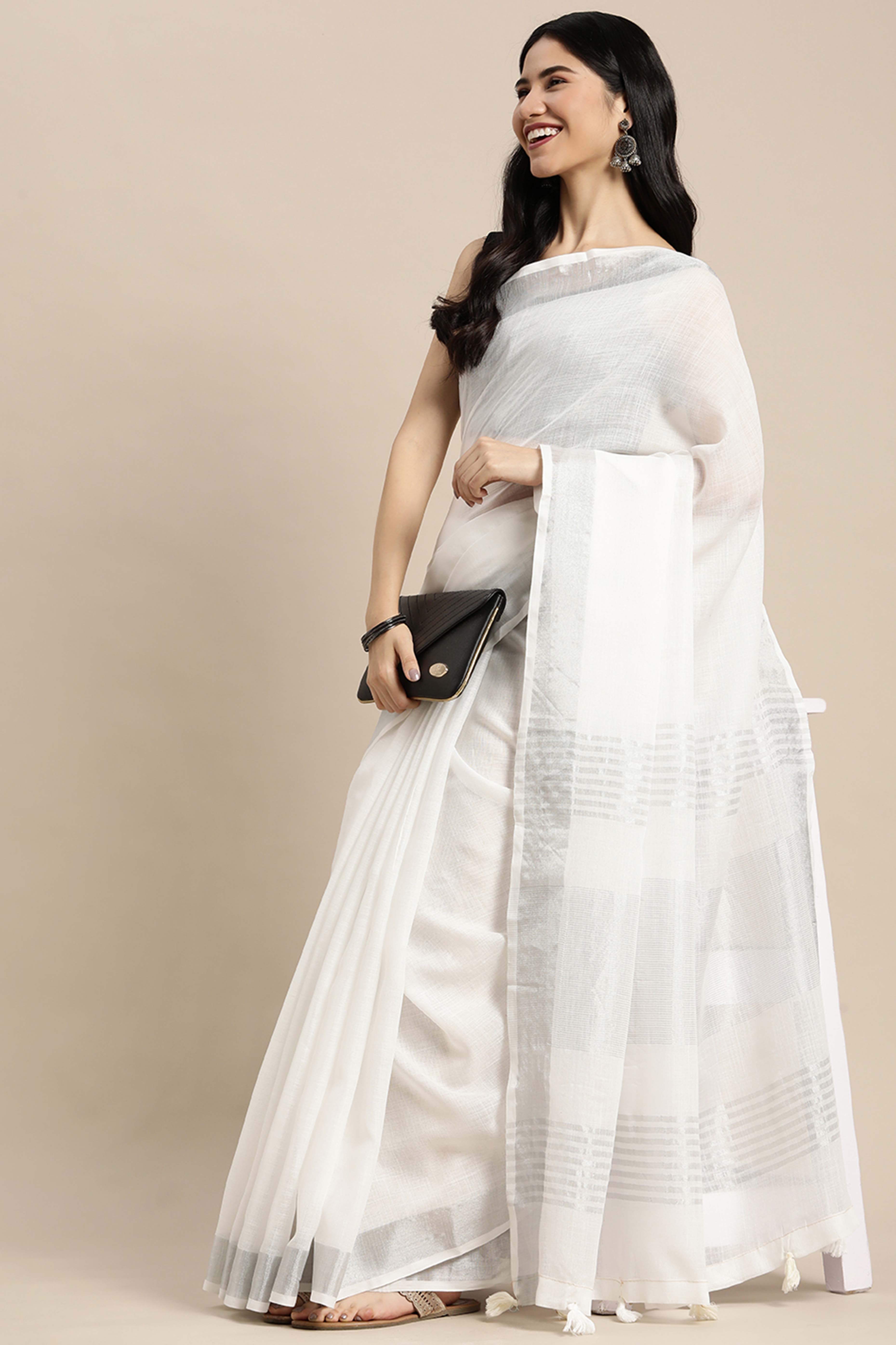 White Linen Saree Adorned With Silver Zari Weaving Border & Pallu