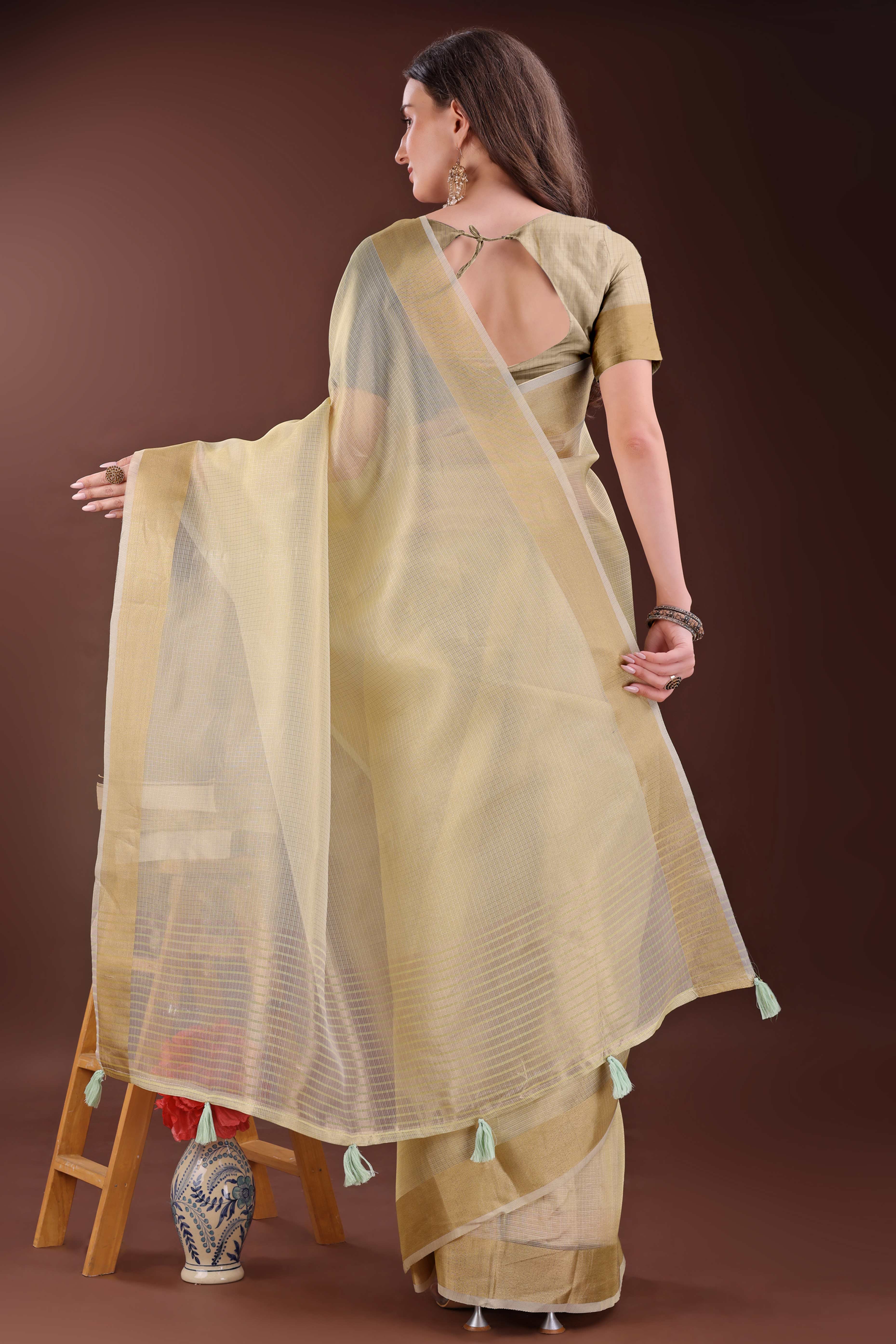 Light Yellow Zari Woven Organza Saree With Graceful Tassel Border