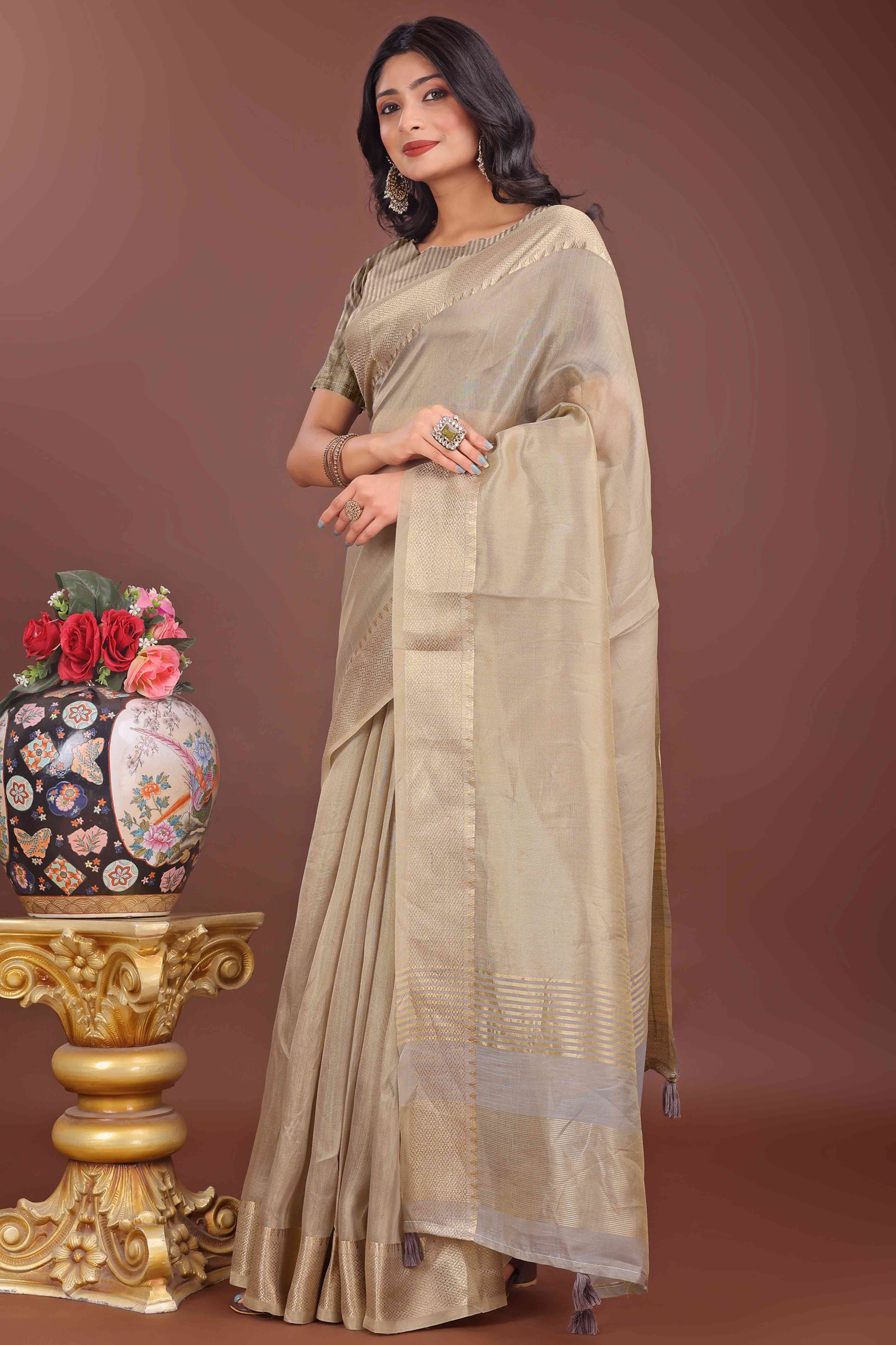 Beige Solid With Zari Woven Organza Saree With Tassel Border