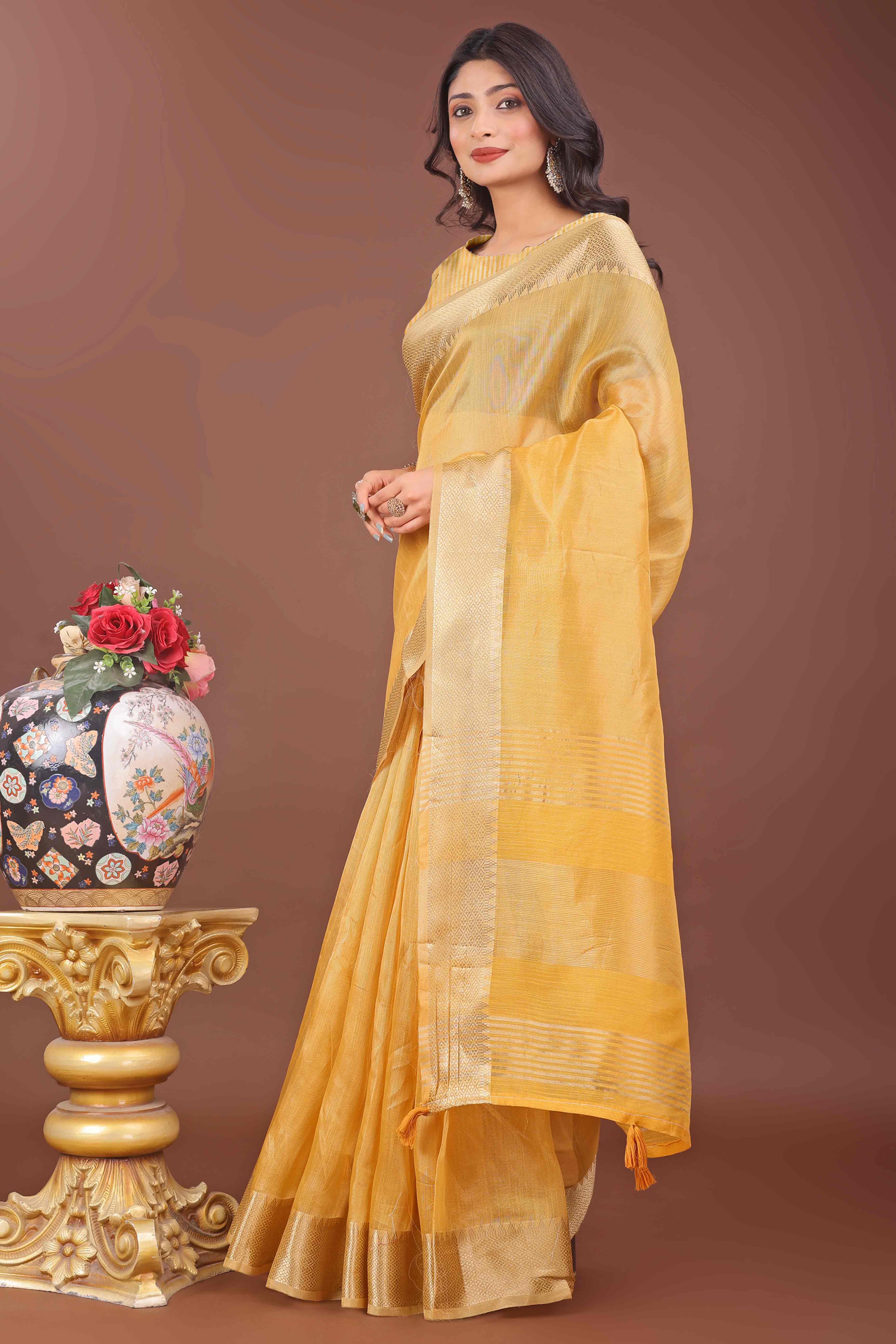 Yellow Solid With Zari Woven Organza Saree With Tassel Border
