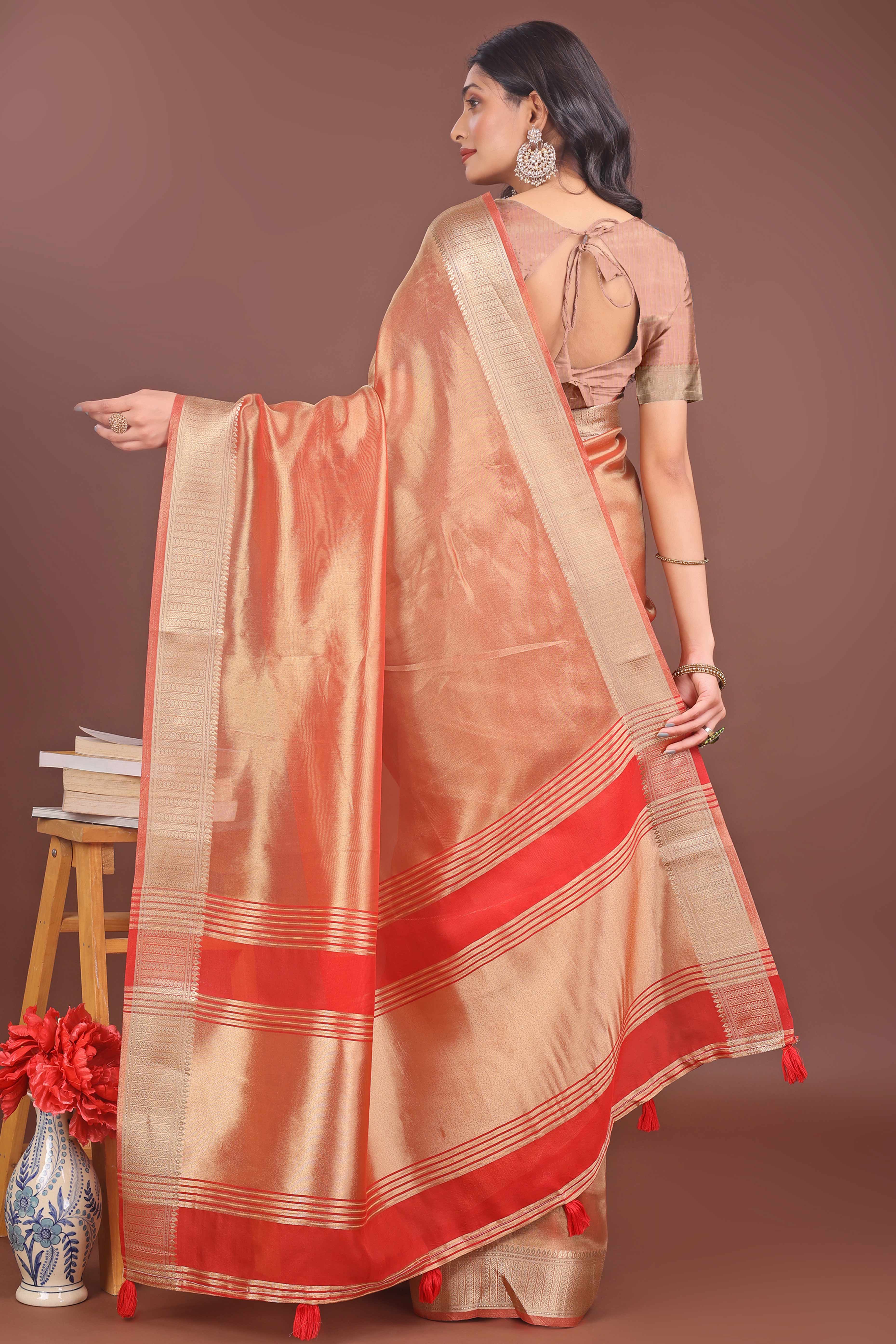 Light Orange Organza Solid Saree With Lustrous Zari Weave &  Delicate Tassels
